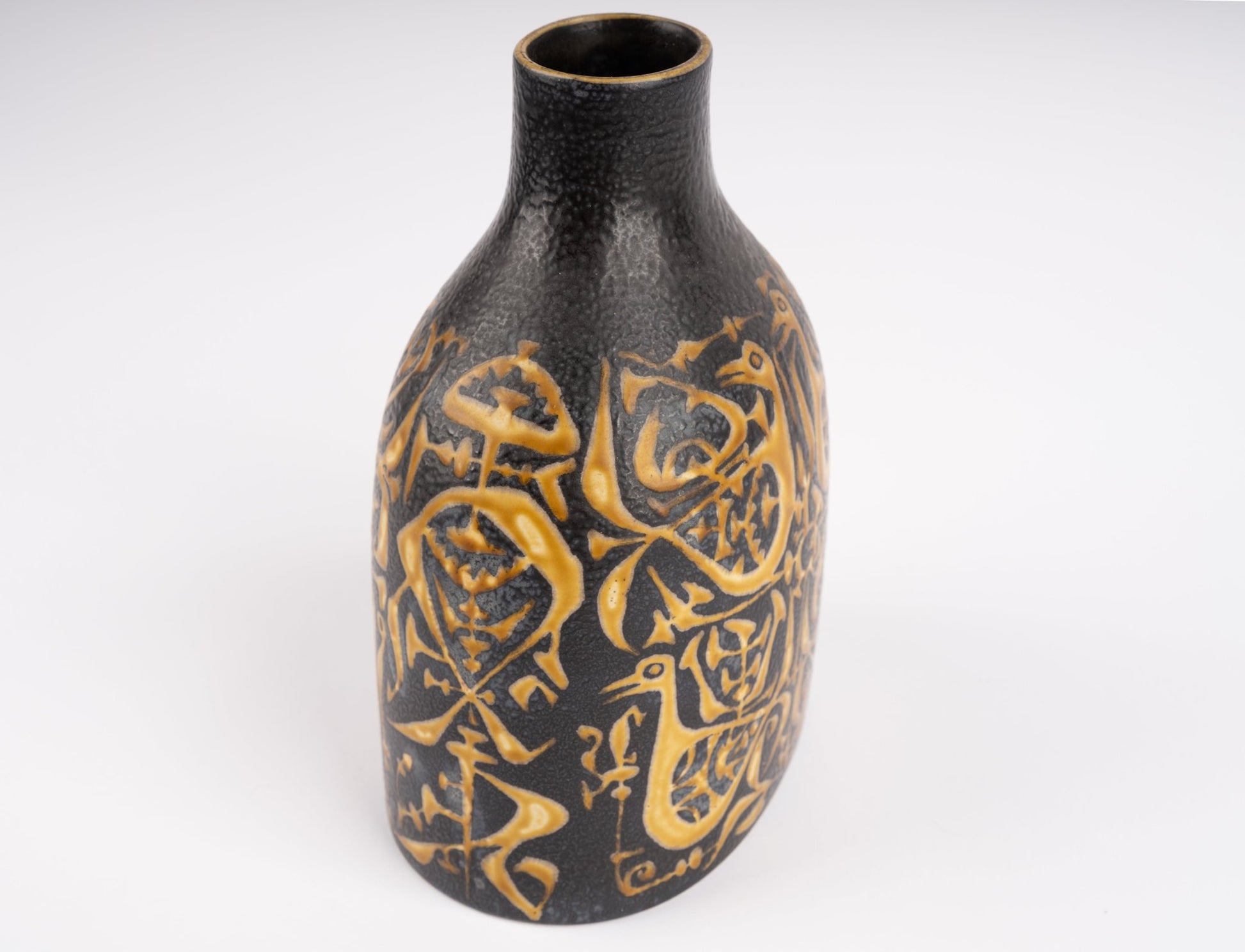 1960s Nils Thorsson fajance vase for Royal Copenhagen with black glaze and abstract golden graphic decoration