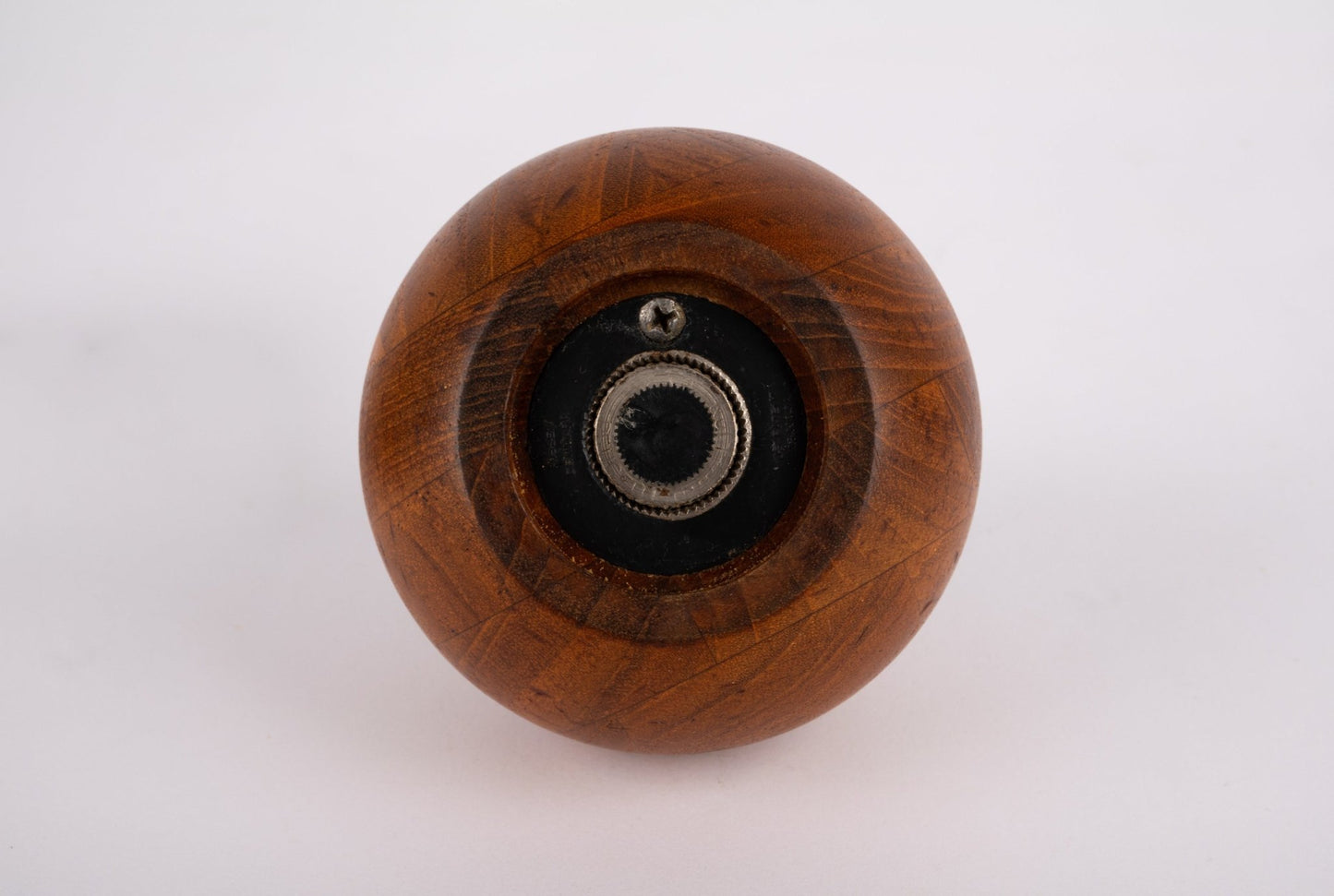 Bottom view of 1960s Nissen & Jorgensen Danish salt and pepper mill with solid teak and iron grinder mechanism