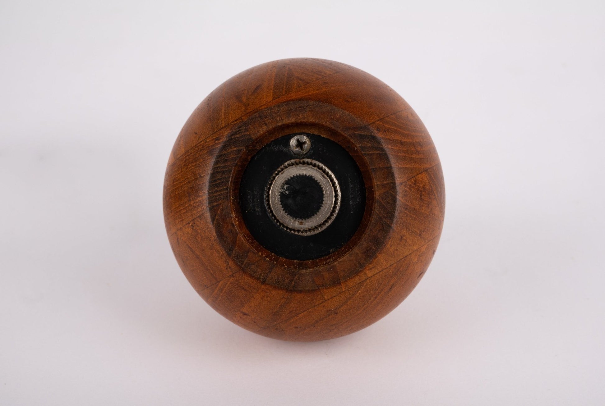 Bottom view of 1960s Nissen & Jorgensen Danish salt and pepper mill with solid teak and iron grinder mechanism