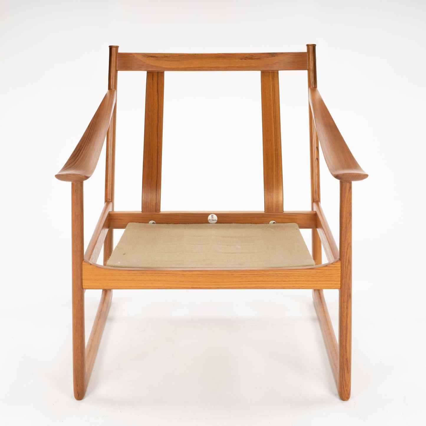 Front view of a wooden chair frame with angled armrests and a beige fabric seat sling against a white background