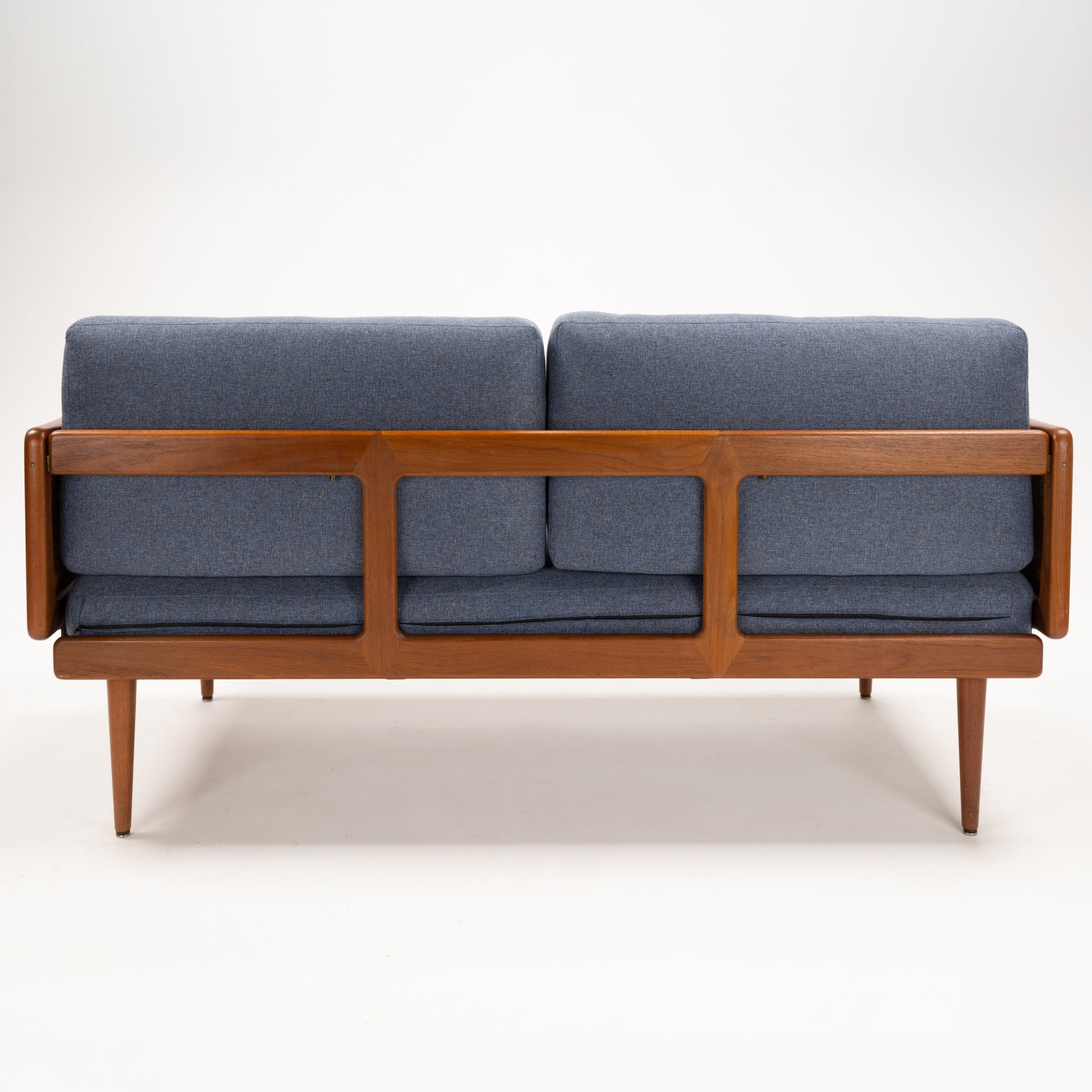 Peter Hvidt & Orla Molgaard Model FD 451 Daybed/Sofa front view with blue cushions teak frame and tapered legs in vintage Danish furniture style