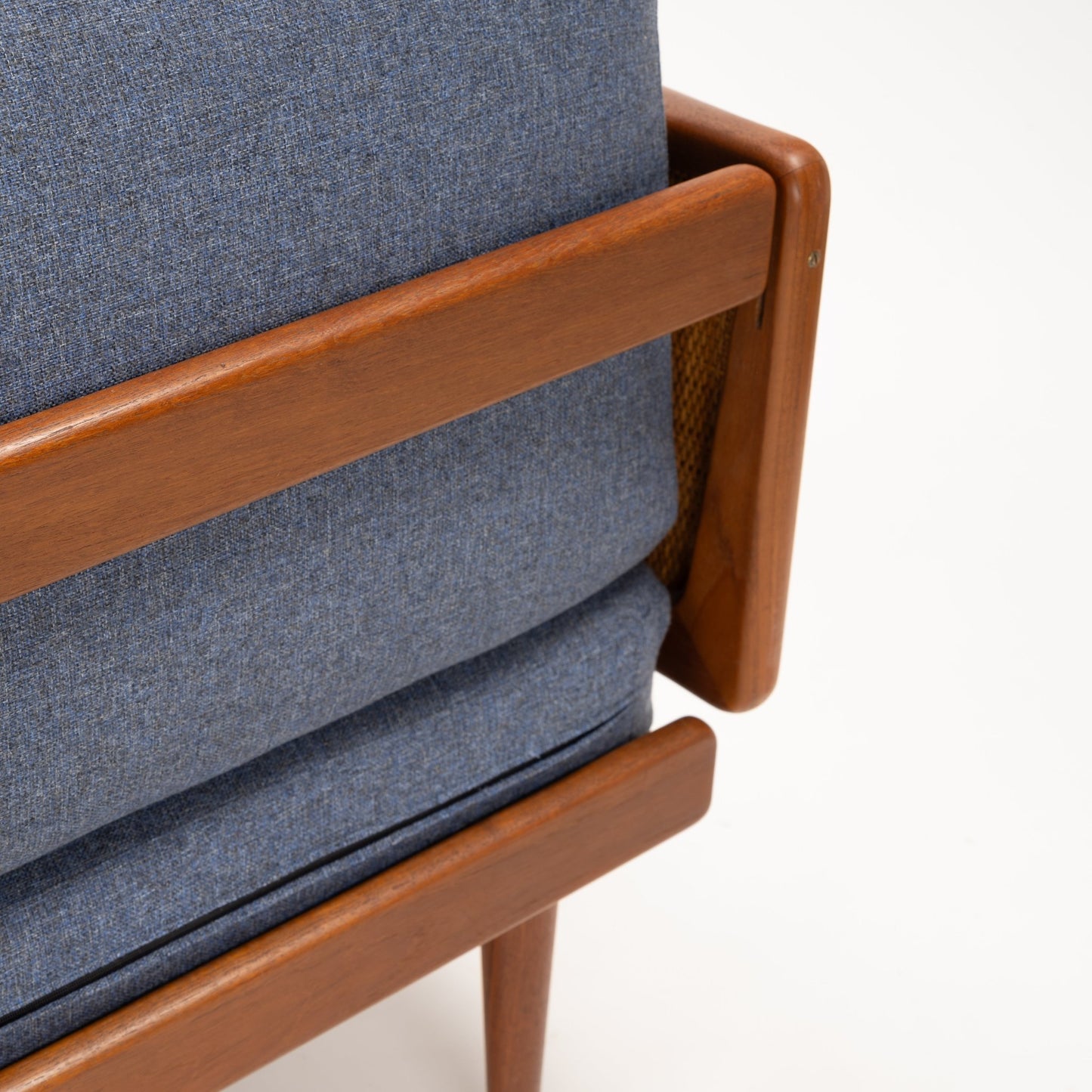 Peter Hvidt & Orla Molgaard Model FD 451 Daybed/Sofa close up of blue upholstery and teak wood armrest in vintage Danish furniture style