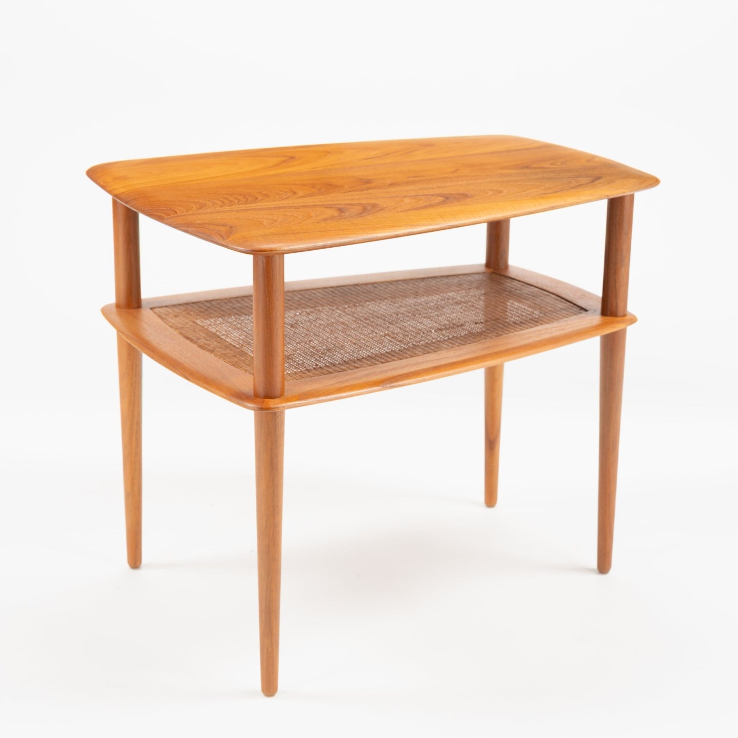 Peter Hvidt & Orla Molgaard Pair of End Tables with smooth wooden tops featuring natural grain, woven cane lower shelves, and tapered legs exemplifying refined mid century modern furniture design.