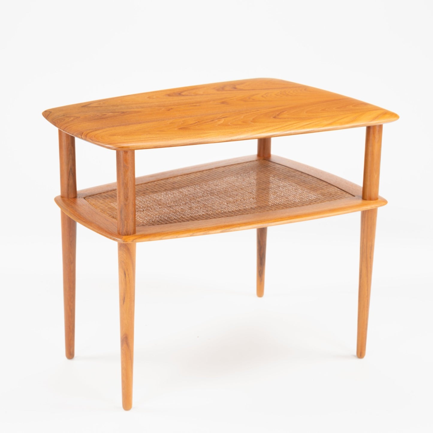 Peter Hvidt & Orla Molgaard Pair of End Tables featuring a sleek wooden top with natural grain, woven cane lower shelf, and elegantly tapered legs in mid century modern style.