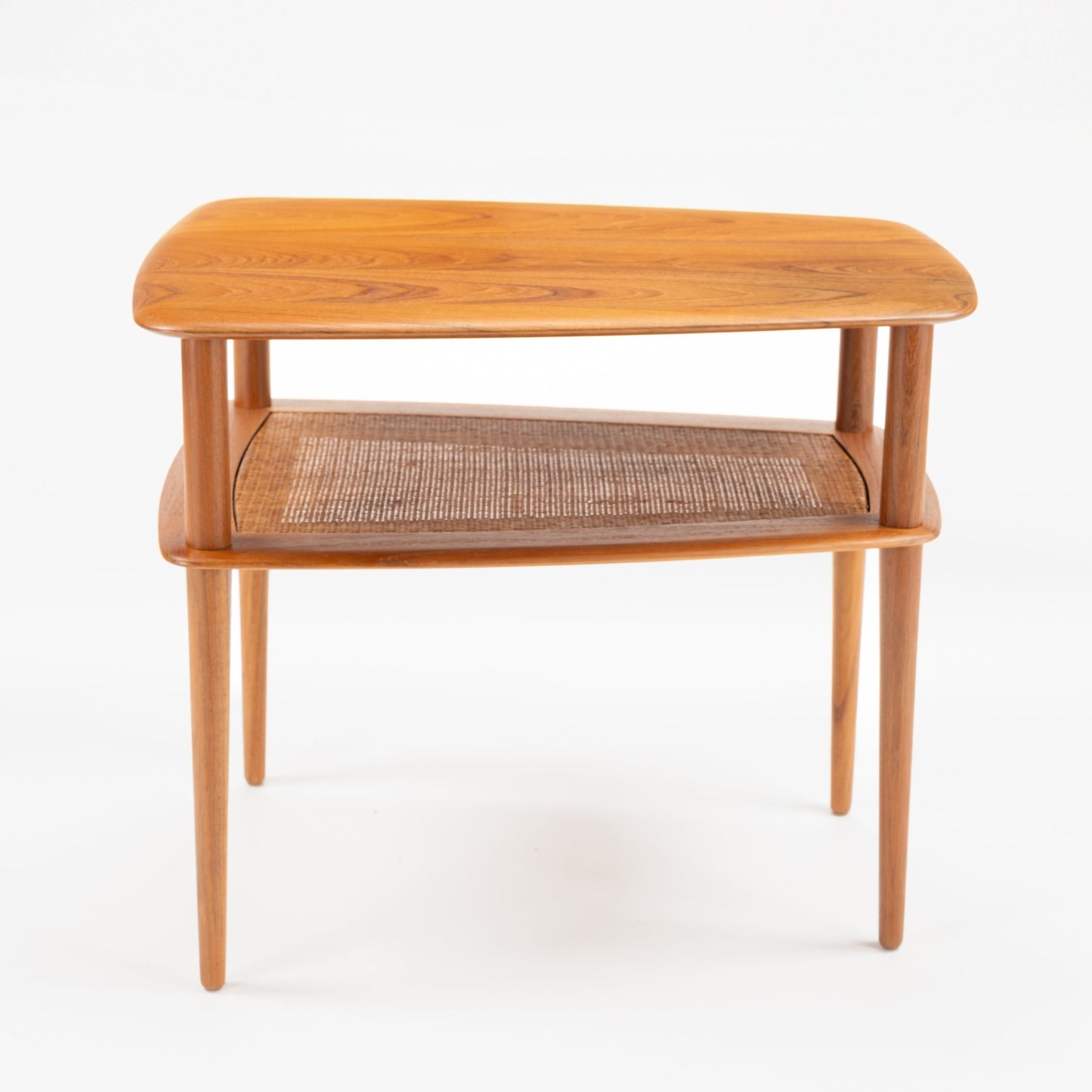 Peter Hvidt & Orla Molgaard Pair of End Tables with gently rounded wooden tops, woven cane lower shelves, and slender tapered legs showcasing elegant mid century modern craftsmanship.