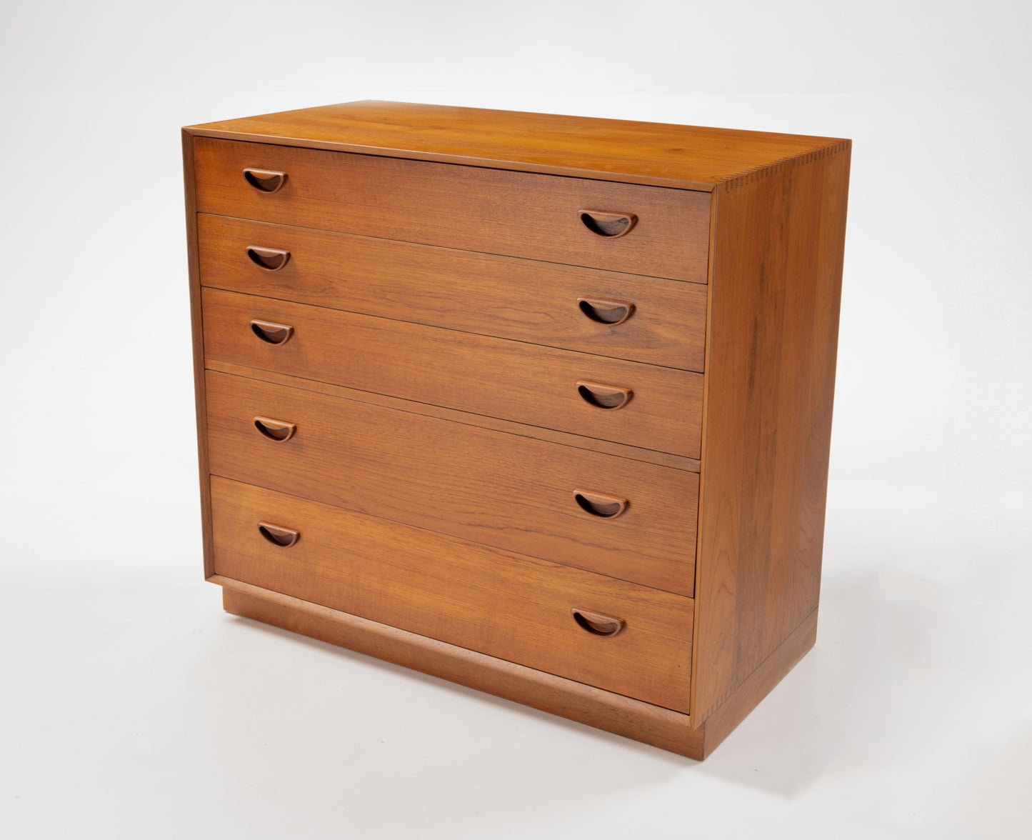 Peter Hvidt solid teak five-drawer dresser with minimalist Danish modern design from mid-20th century