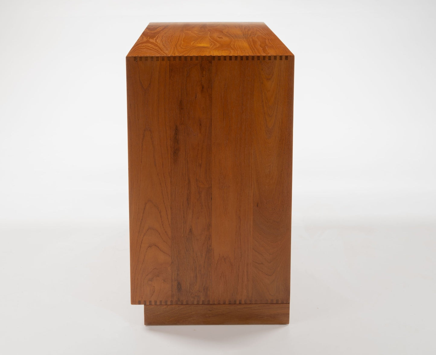 Side view of Peter Hvidt solid teak Danish dresser drawer grouping with visible wood grain and joinery details