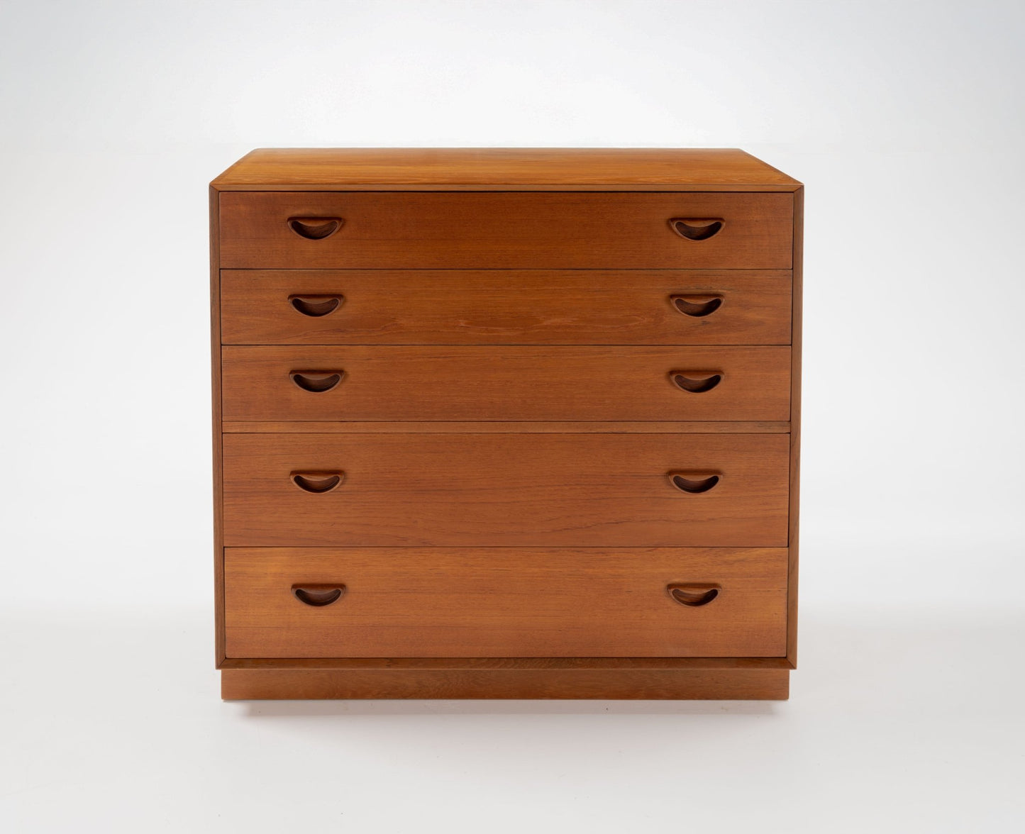Peter Hvidt mid-century modern solid teak dresser with five drawers and recessed handles from Denmark