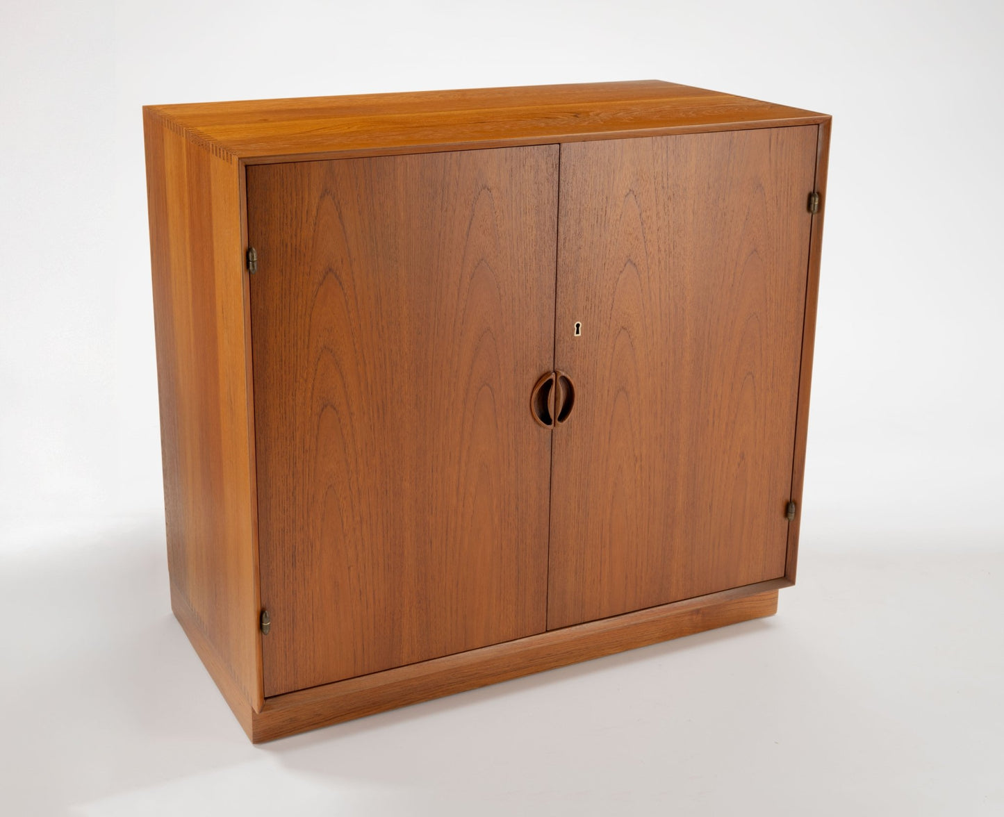 Peter Hvidt solid teak two-door cabinet with minimalist Danish mid-century design from the 1950s