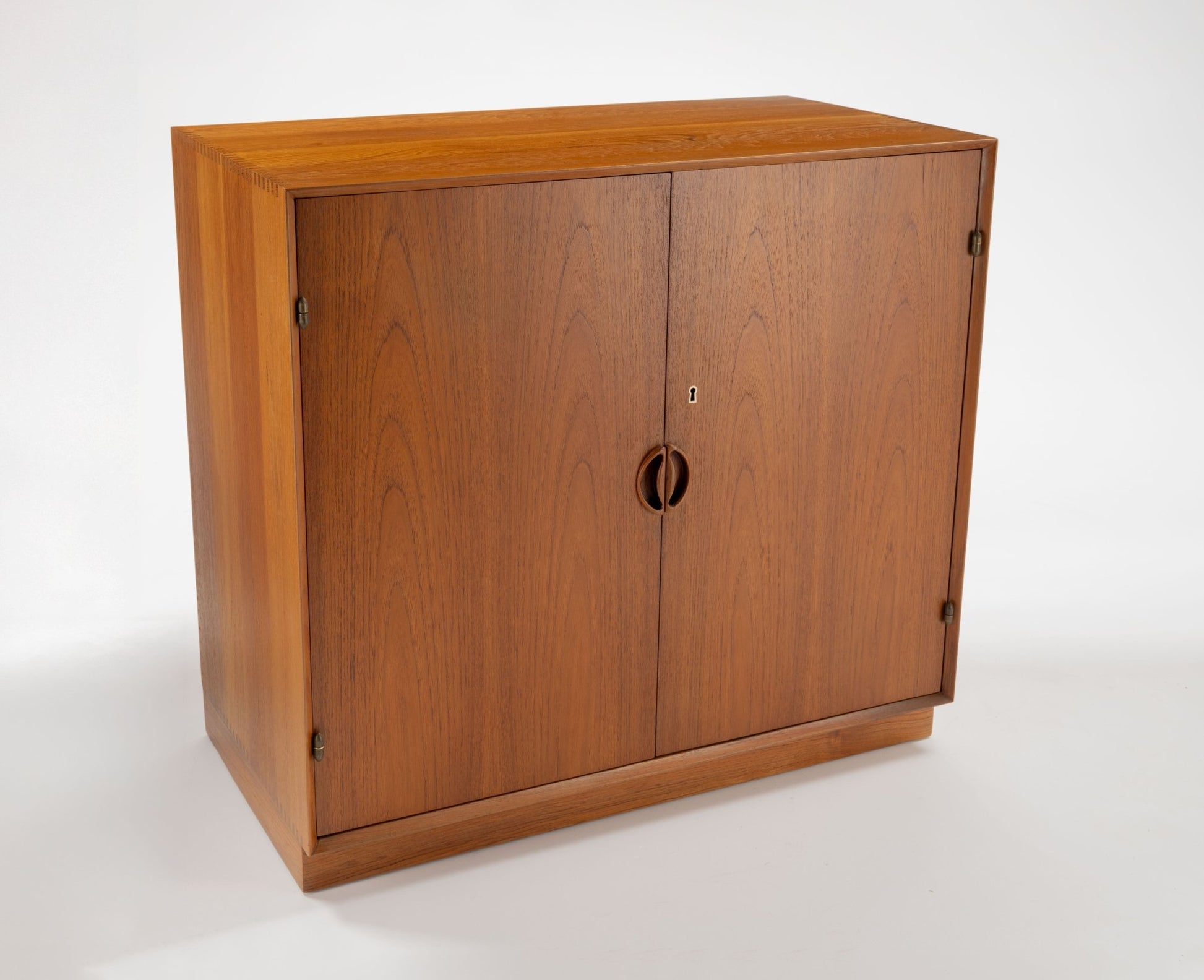Peter Hvidt solid teak two-door cabinet with minimalist Danish mid-century design from the 1950s