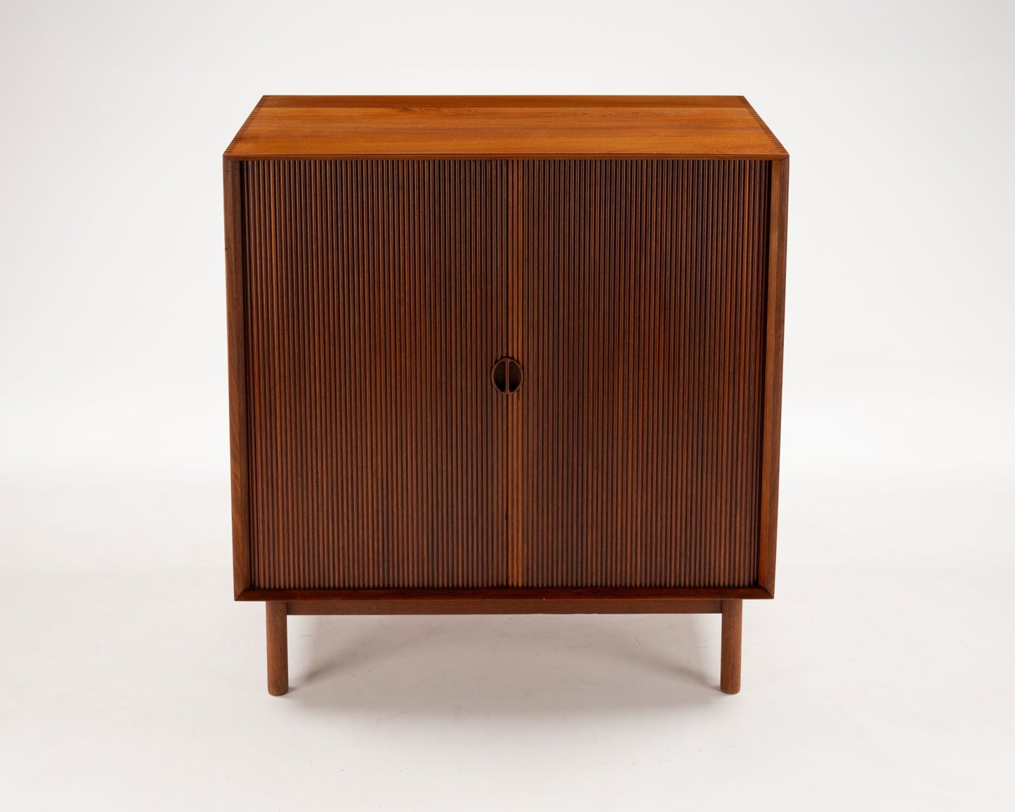 Peter Hvidt 1950s Danish teak tambour door cabinet with clean-lined Mid-Century Modern design by Søborg Møbler