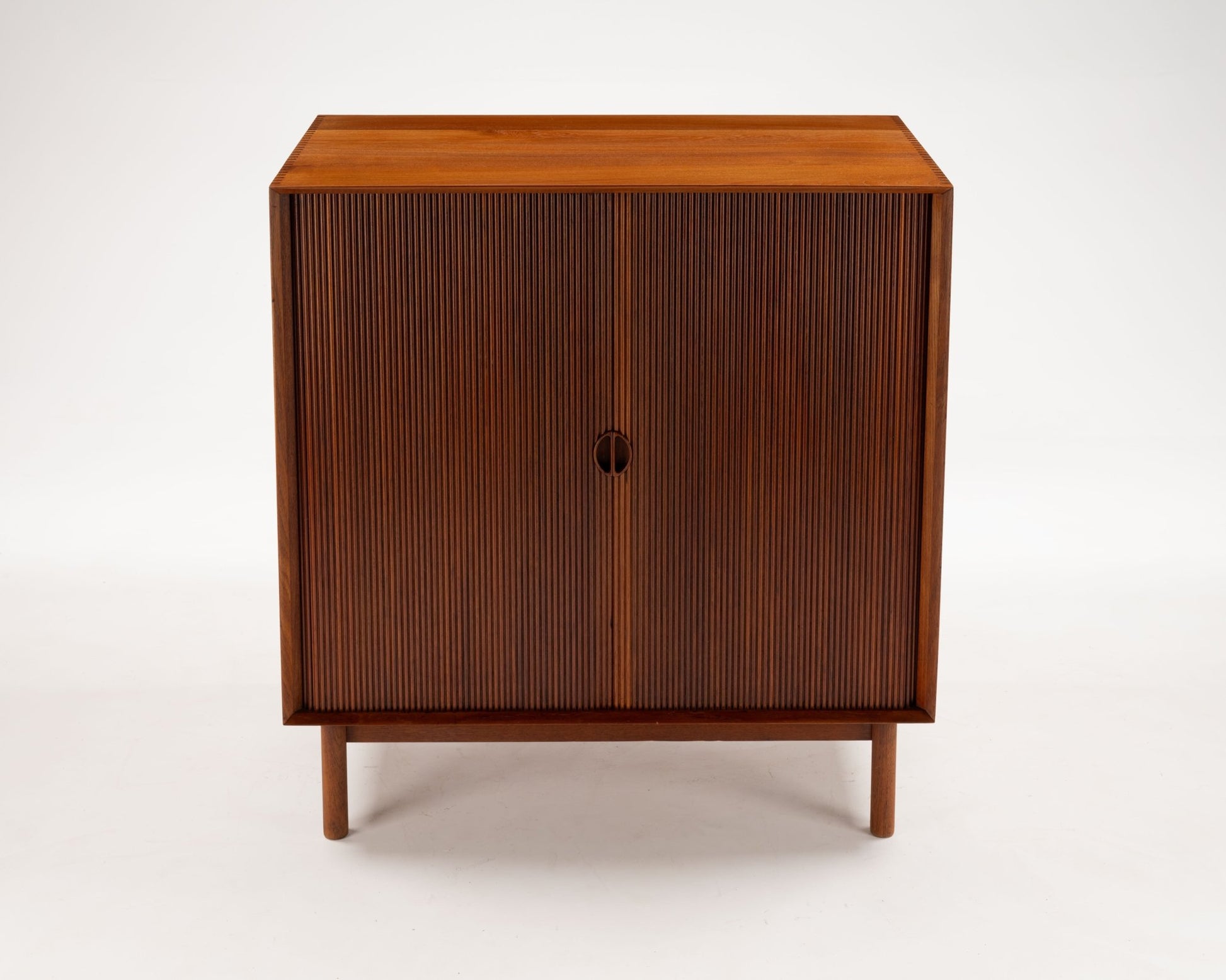 Peter Hvidt 1950s Danish teak tambour door cabinet with clean-lined Mid-Century Modern design by Søborg Møbler