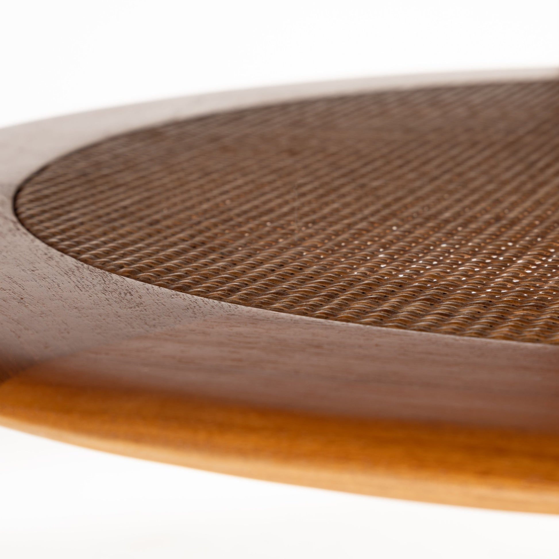 Peter Hvidt Teak Coffee Table Model FD-515 featuring a close-up of its smooth teak wood frame with a finely woven cane center, exemplifying vintage Danish mid century modern furniture design.