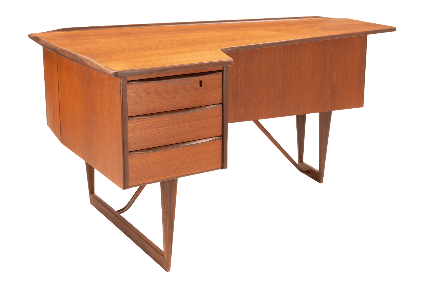 Asymmetrical teak writing desk with three drawers and sculptural angled legs in mid-century Danish design style