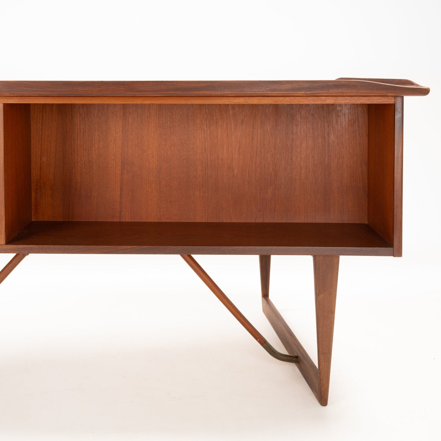 Open storage compartment and angled teak leg detail of 1960s Peter Løvig Nielsen boomerang writing desk
