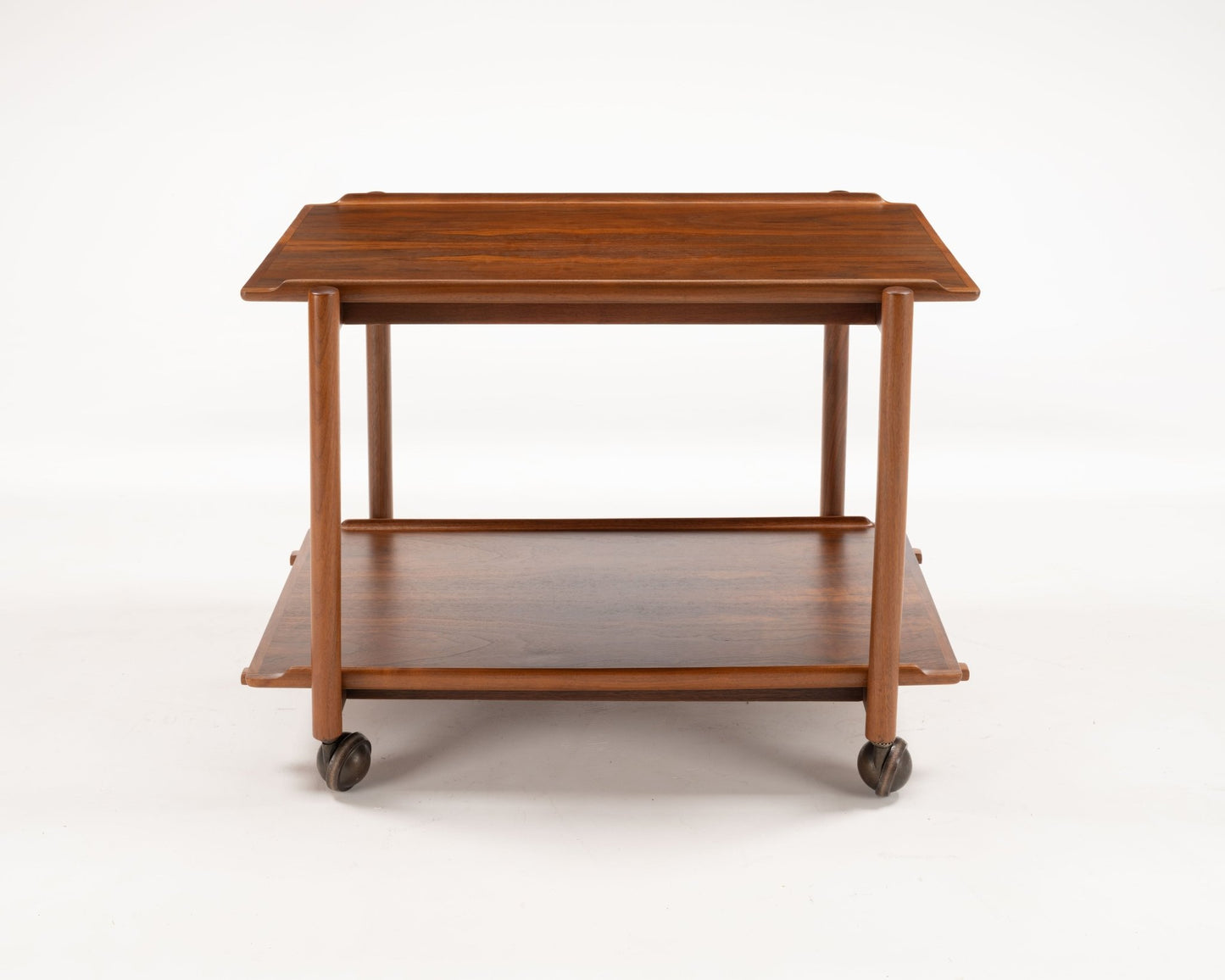 Poul Hundevad teak bar cart from the 1950s with expandable sliding top and lower serving tray on casters
