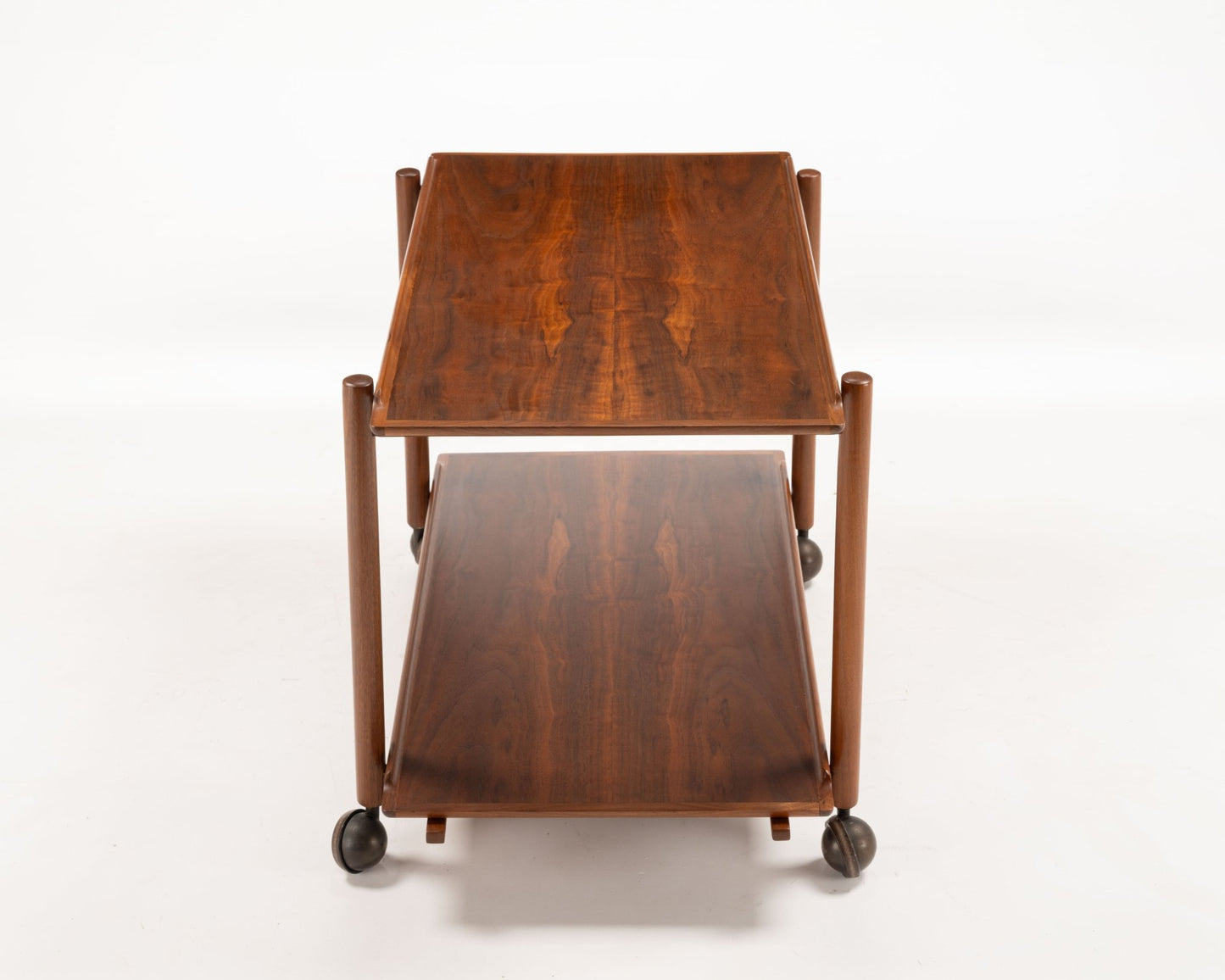 Poul Hundevad teak serving bar cart from 1950s Denmark with expandable sliding top and lower tray on wheels