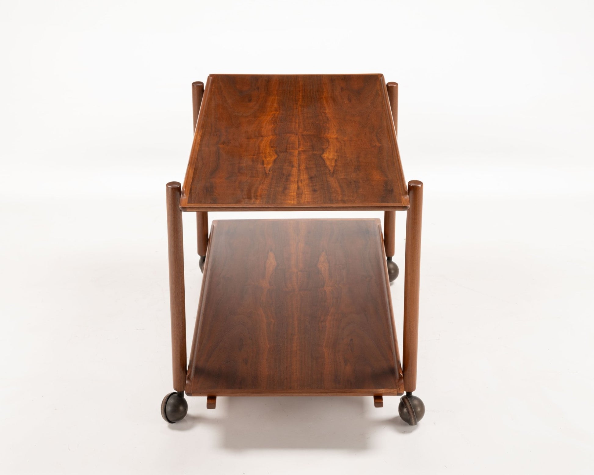 Poul Hundevad teak serving bar cart from 1950s Denmark with expandable sliding top and lower tray on wheels