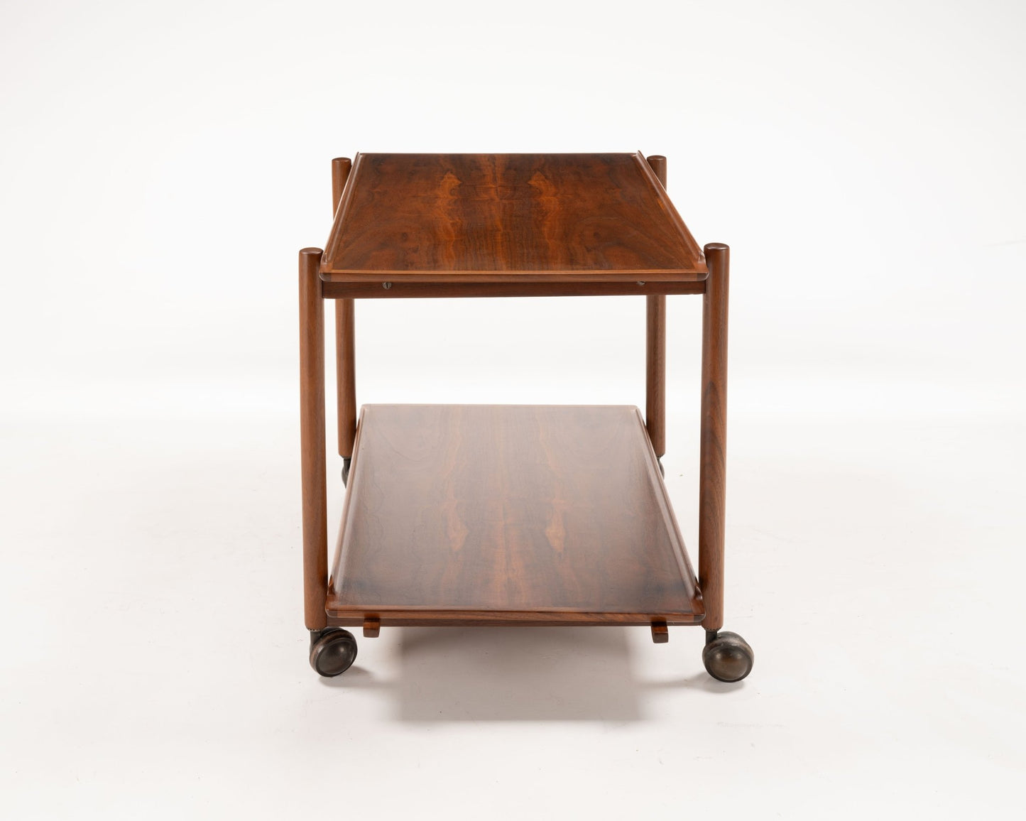 Poul Hundevad teak serving bar cart from the 1950s with expandable sliding top and two-tier design on casters