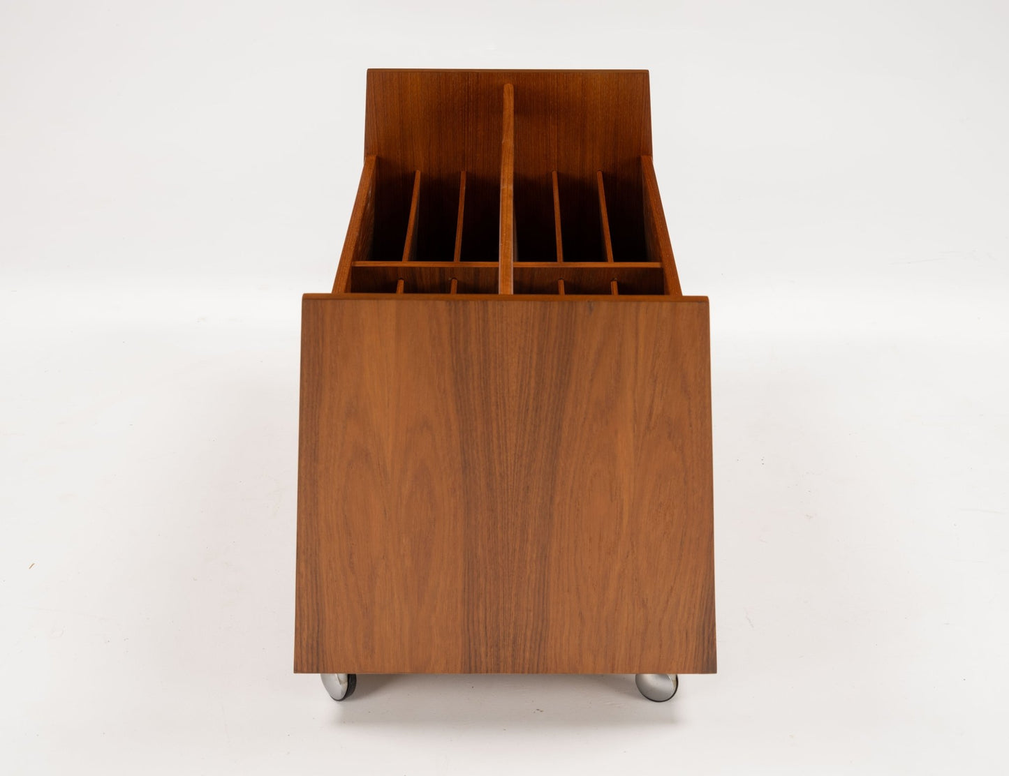Double-wide mid-century modern teak record and magazine caddy with internal dividers, handle, and castors