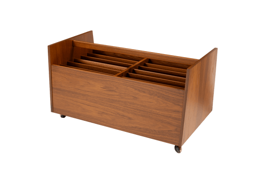Mid-century modern Rolf Hesland teak record and magazine caddy with internal dividers and castor wheels.