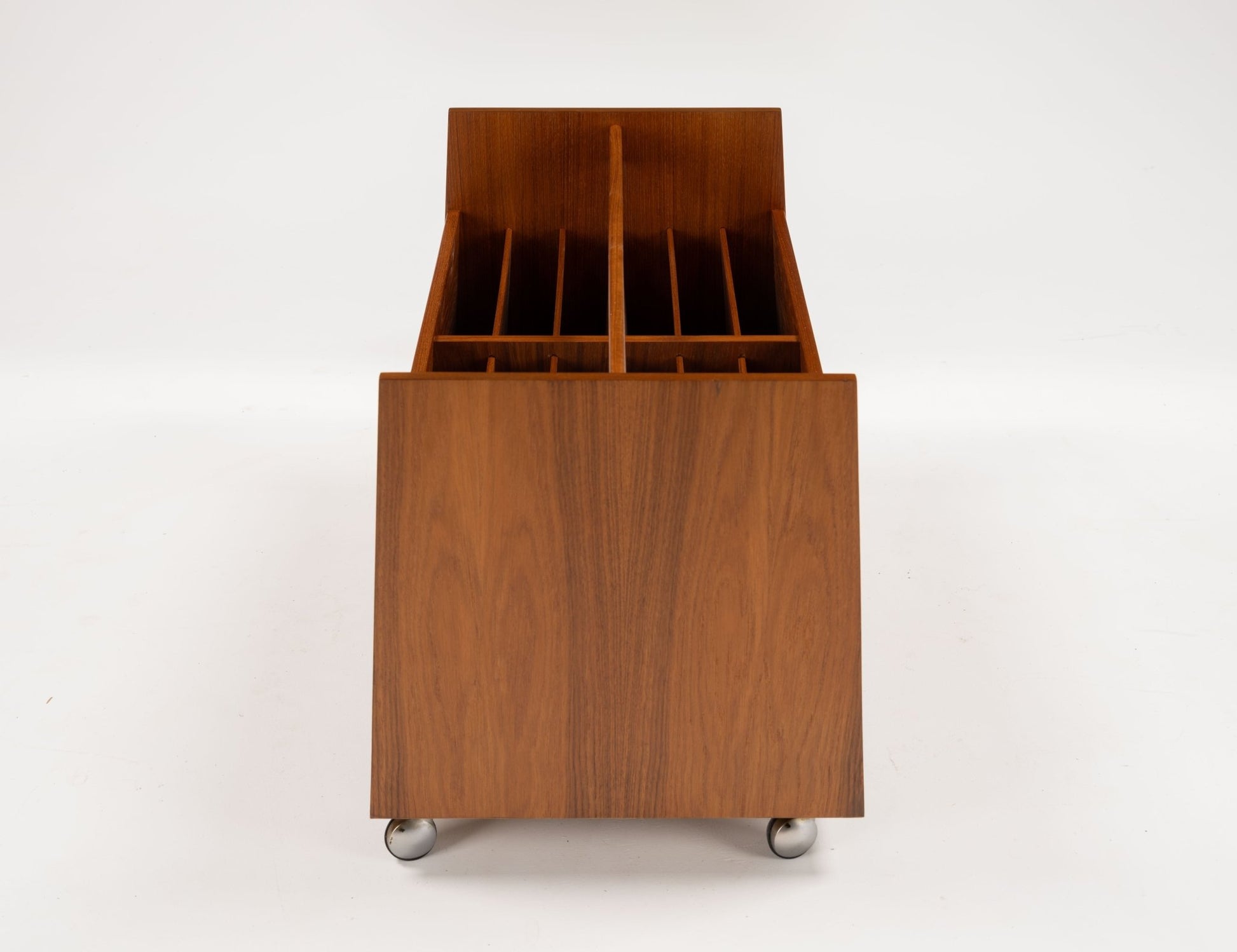 Mid-century modern double-wide teak record caddy with internal dividers and castors designed by Hesland from 1960s Norway