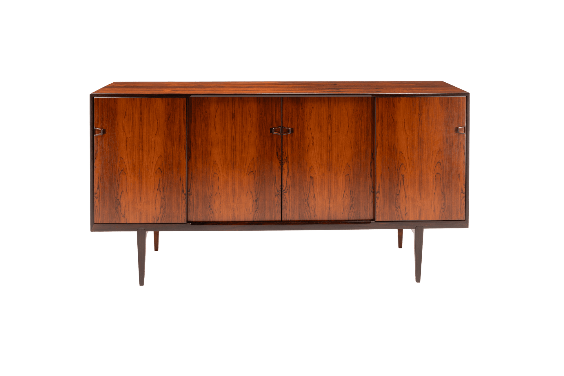 Mid-century modern rosewood credenza with sculpted handles and tapered legs on white background