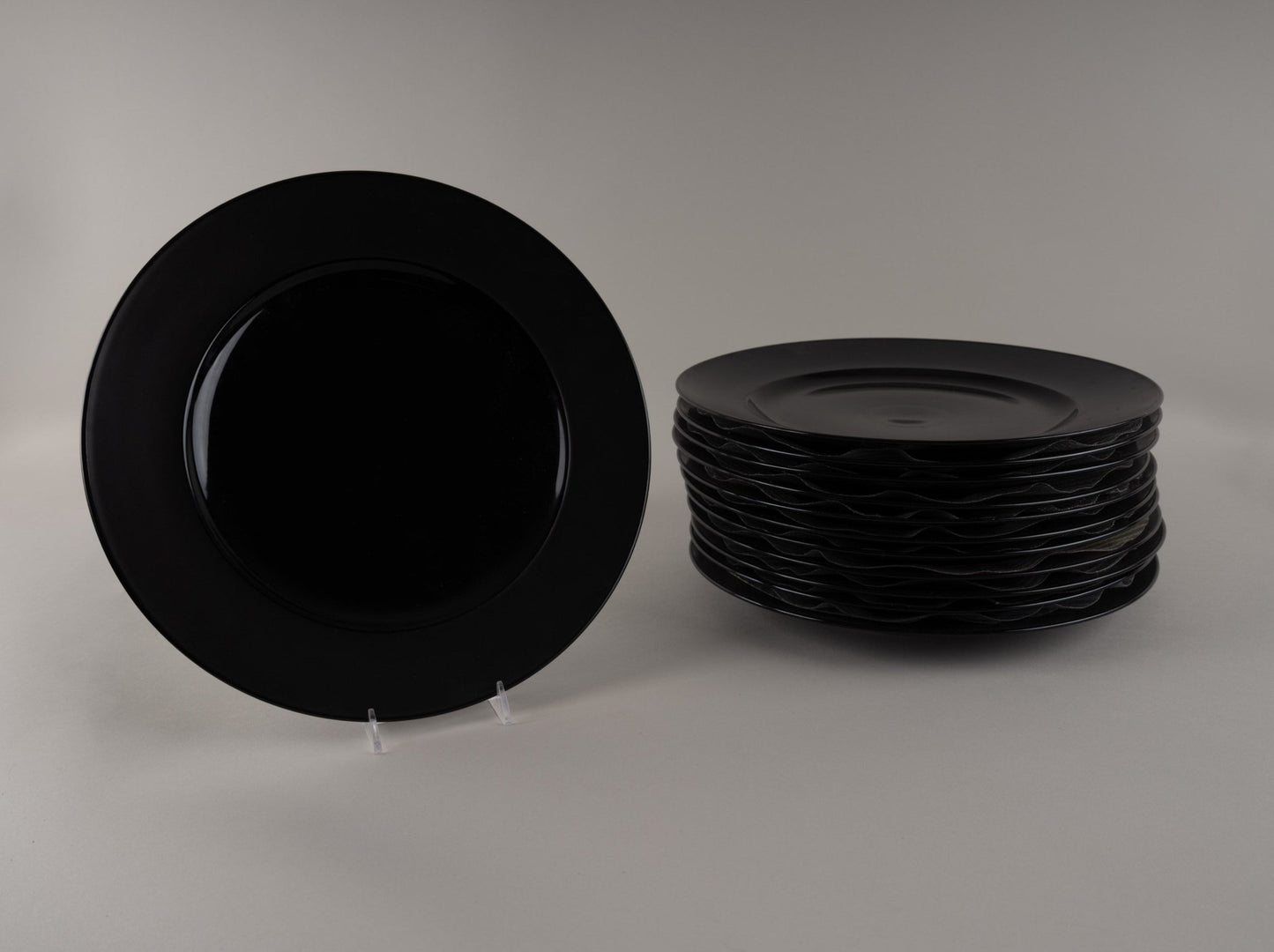 Set of Rosenthal "Charcoal" black eggshell china plates designed by Raymond Loewy, produced 1955-1965, stacked