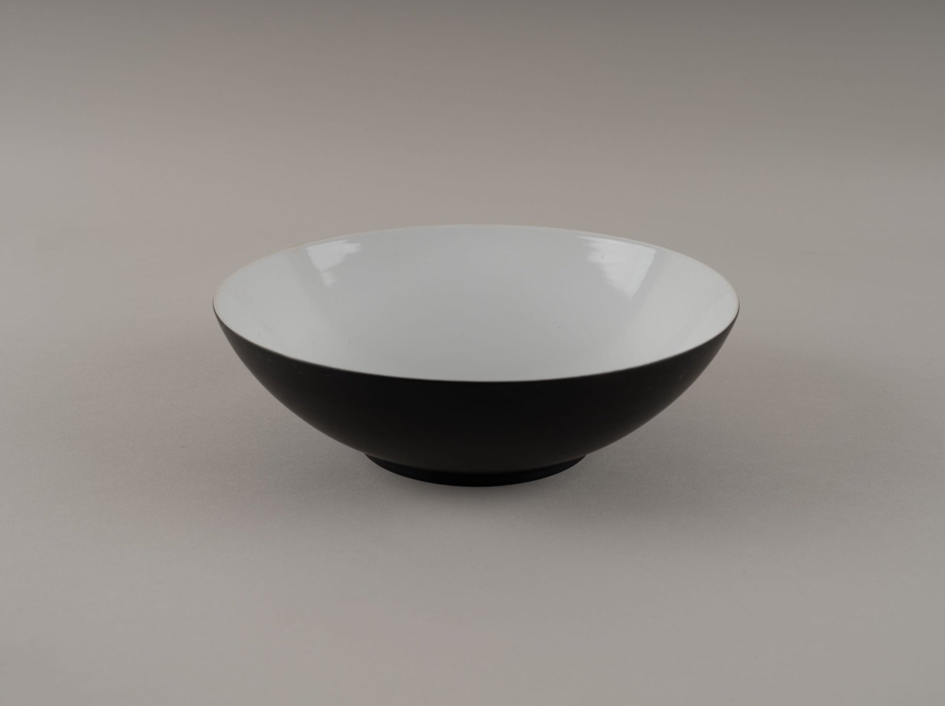 Eggshell black Raymond Loewy Rosenthal "Charcoal" china bowl from 1950s with glossy interior and matte exterior finish