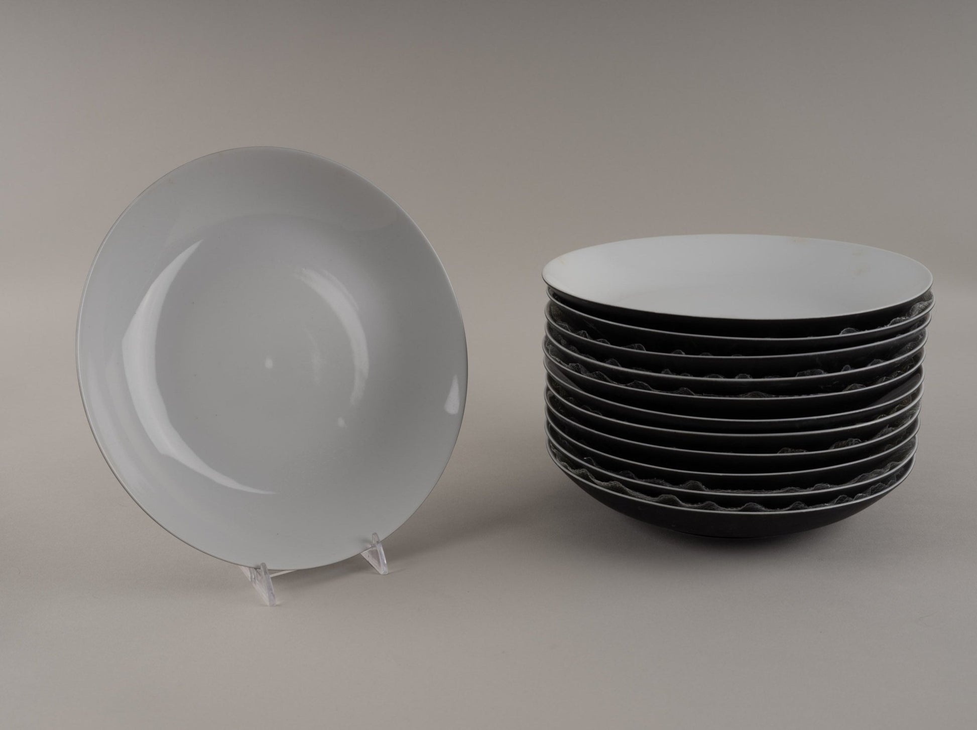 Set of Rosenthal "Charcoal" eggshell black china bowls designed by Raymond Loewy, made from 1955 to 1965