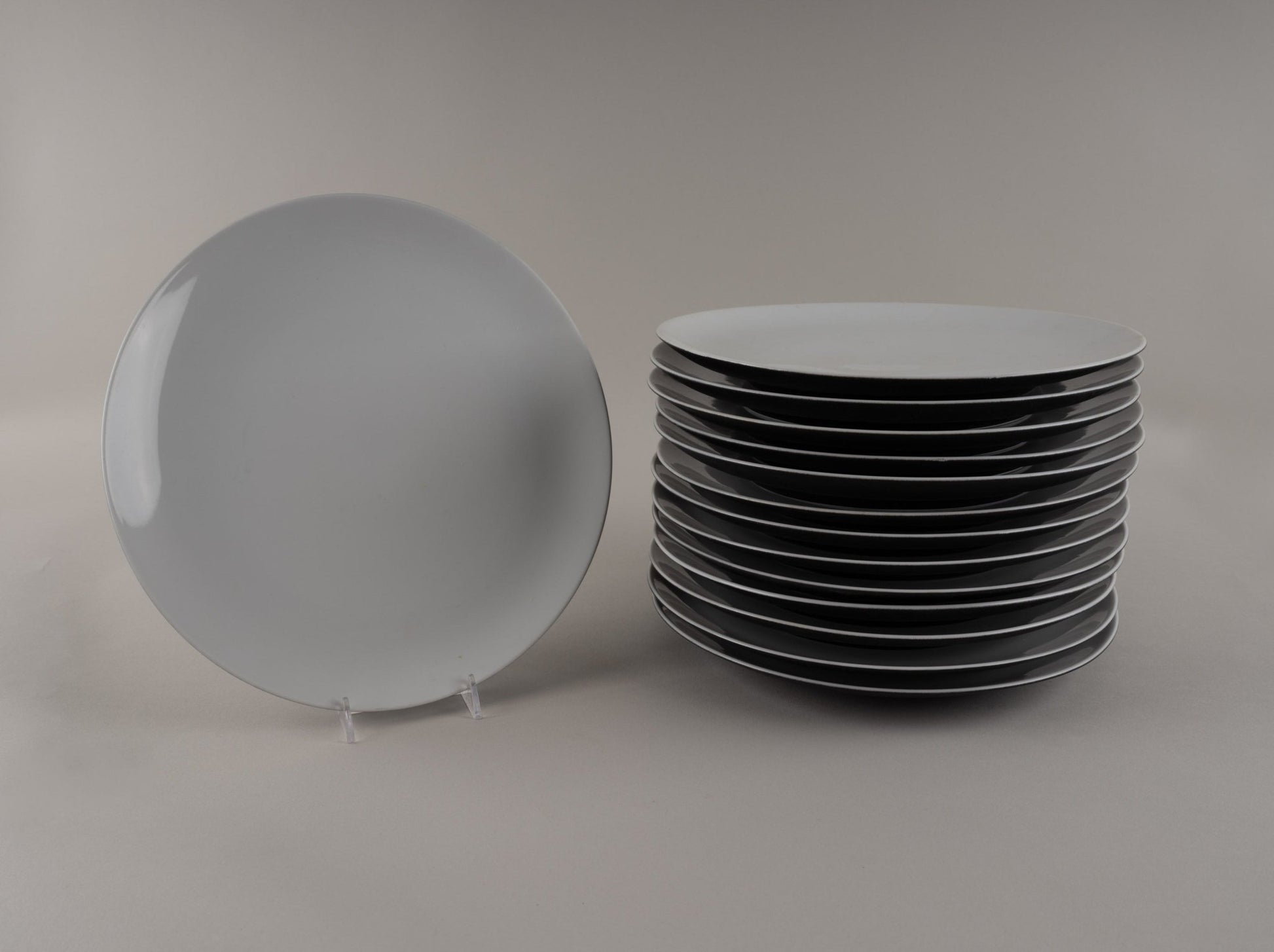 Set of Rosenthal "Charcoal" eggshell black china plates designed by Raymond Loewy, circa 1955-1965, rare collector's item.