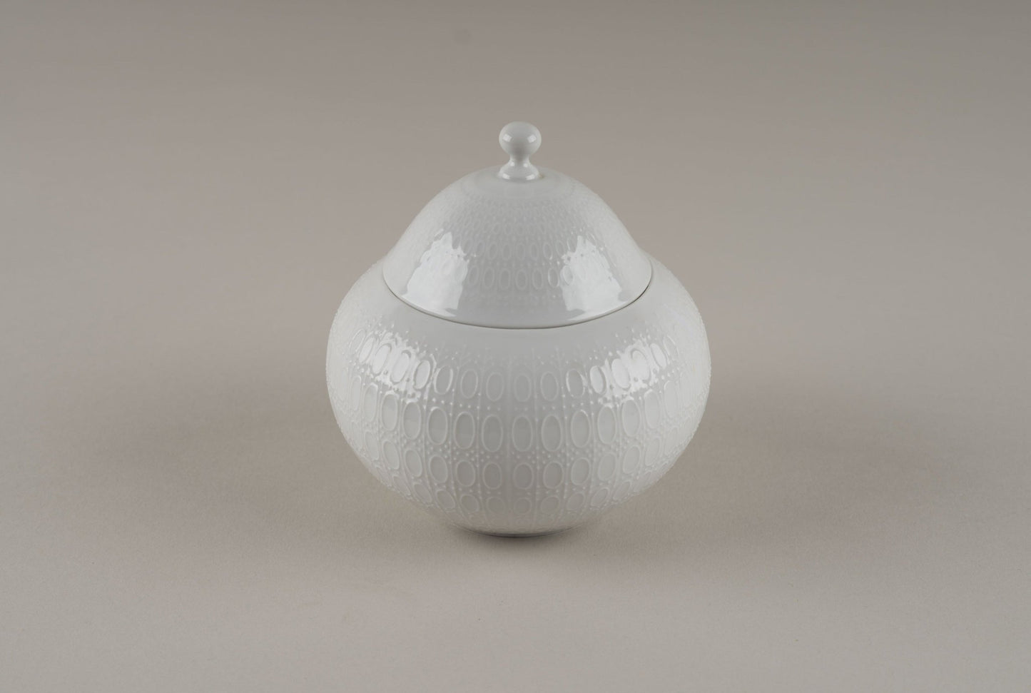 Rosenthal "Romance" covered porcelain sugar bowl with embossed oval and dot pattern by Bjorn Wiinblad