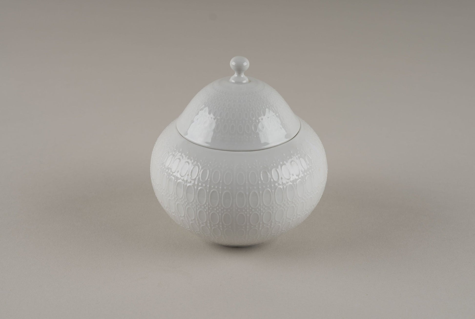 Rosenthal "Romance" covered porcelain sugar bowl with embossed oval and dot pattern by Bjorn Wiinblad