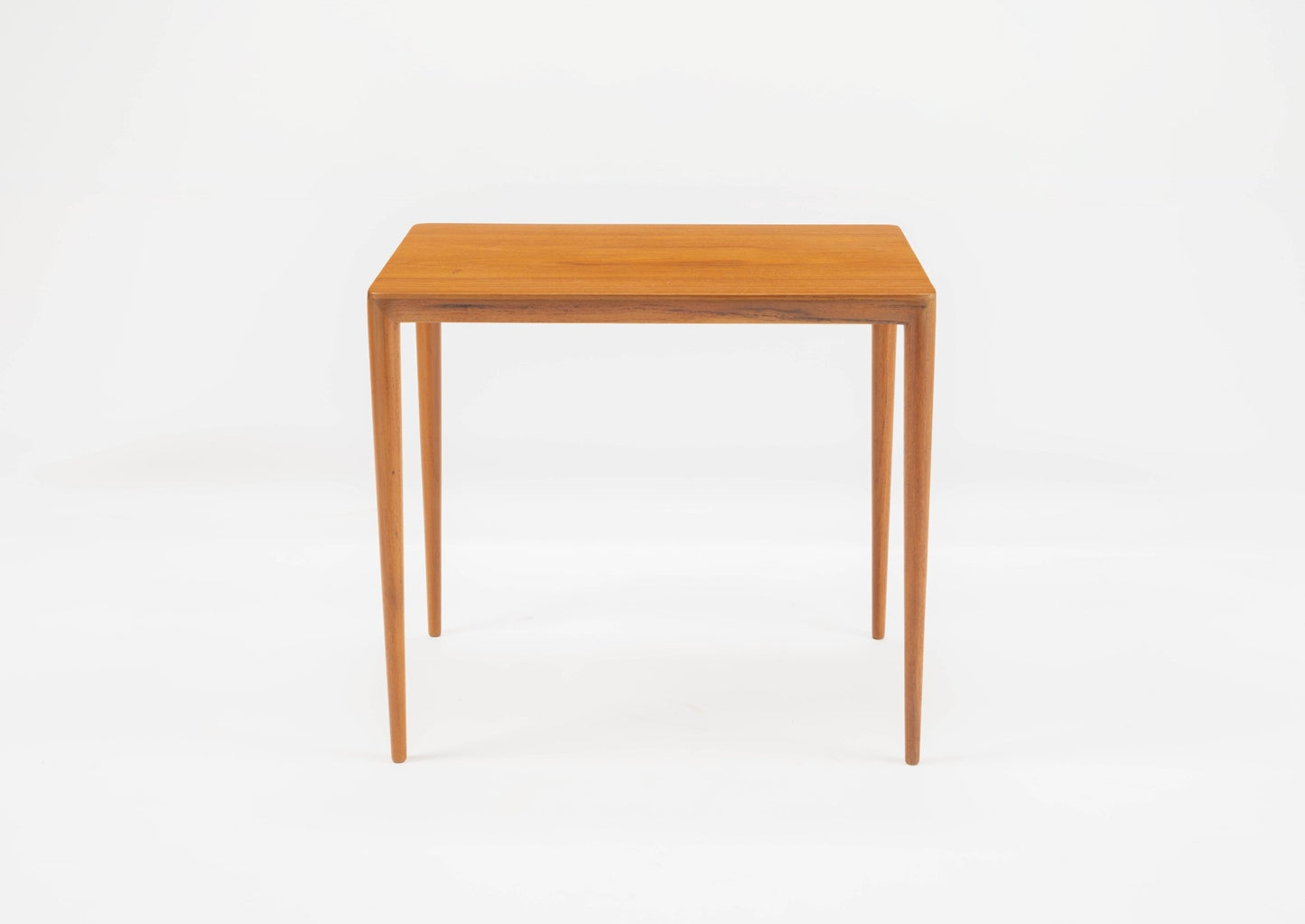 Teak side table in the style of Severin Hansen with beveled edges and tapered round legs, 1960s Danish design.