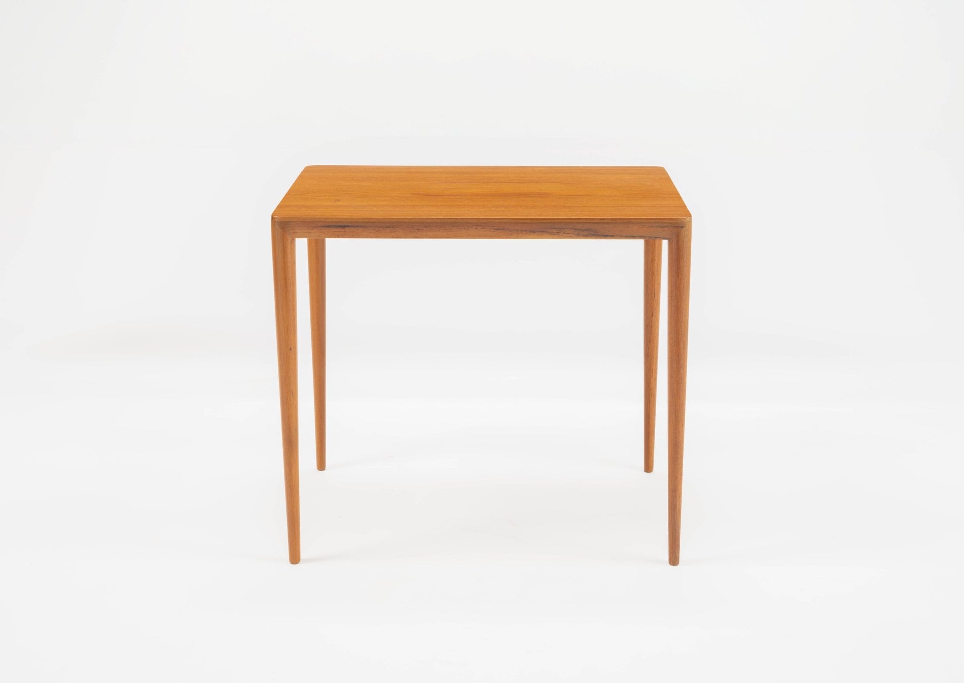 Teak side table in the style of Severin Hansen with beveled edges and tapered round legs, 1960s Danish design.