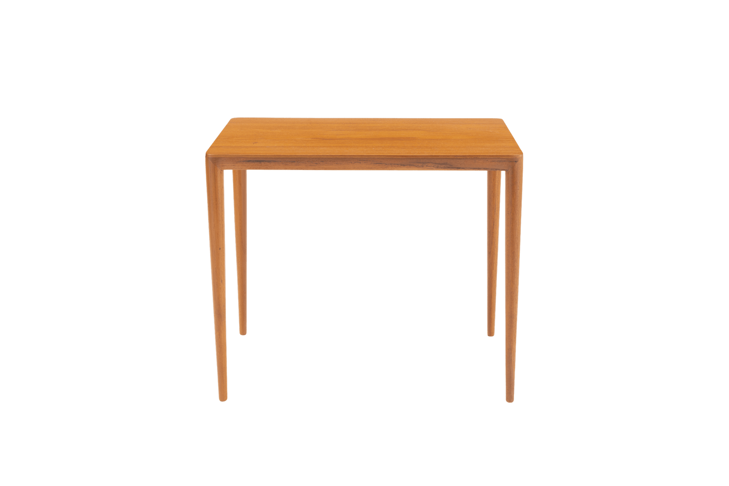 Mid-century modern teak side table in the manner of Severin Hansen with beveled edges and tapered round legs.