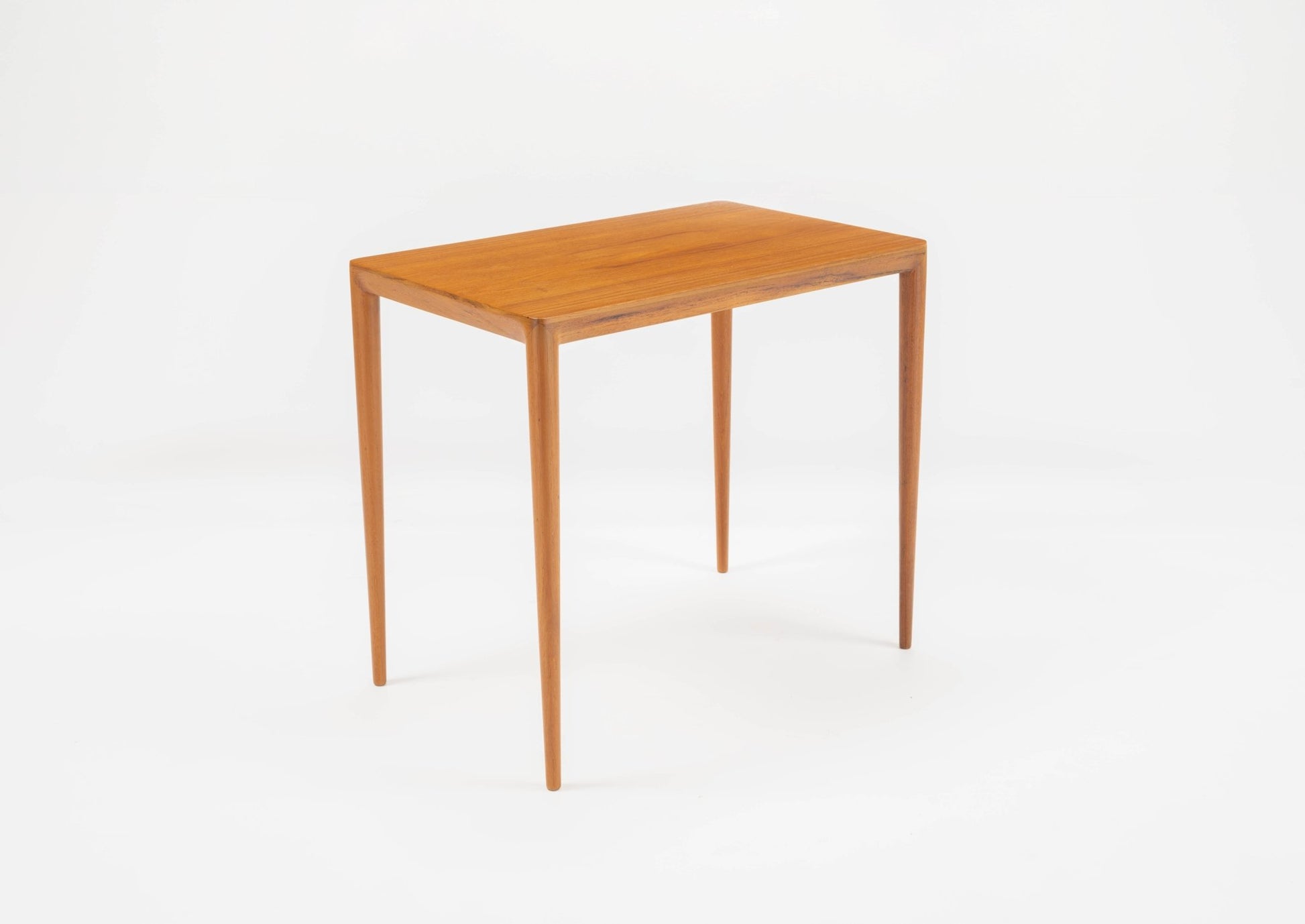 Teak side table in the manner of Severin Hansen with beveled edges and tapered round legs, Danish 1960s design