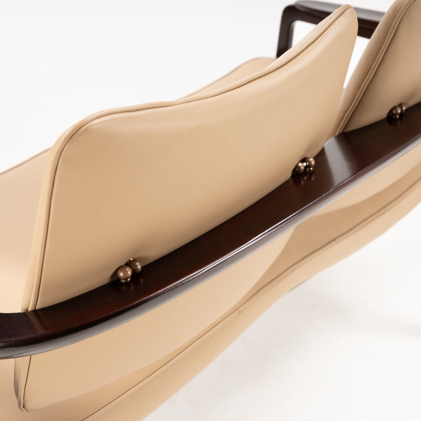 Sigvard Bernadotte Model FD132 Sofa showcasing smooth beige leather cushions with a dark wooden frame and elegant brass fittings, reflecting vintage Danish mid century modern seating design.