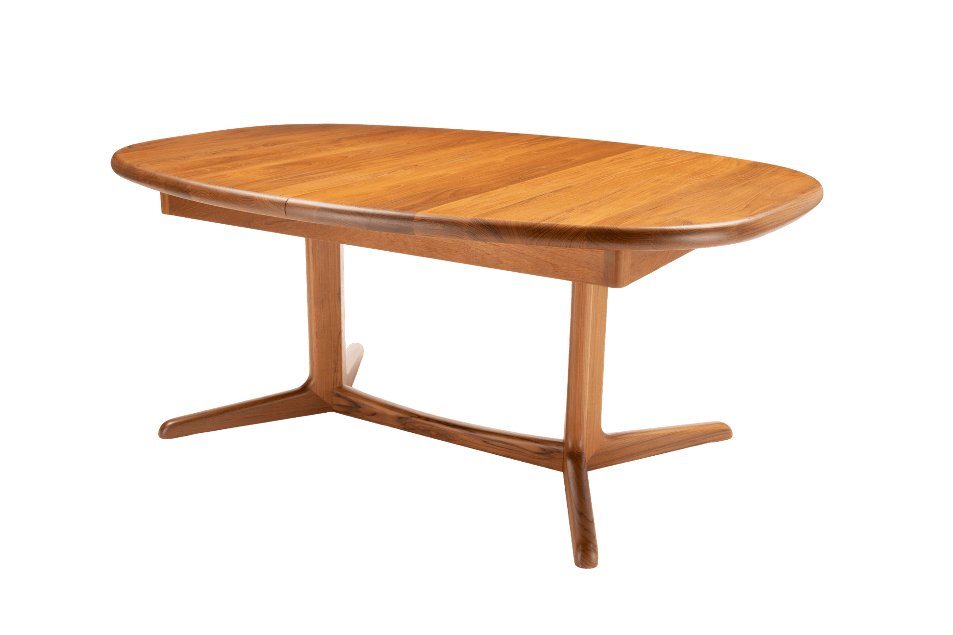 Mid-century modern teak racetrack dining table with rounded edges and central pedestal base on white background.