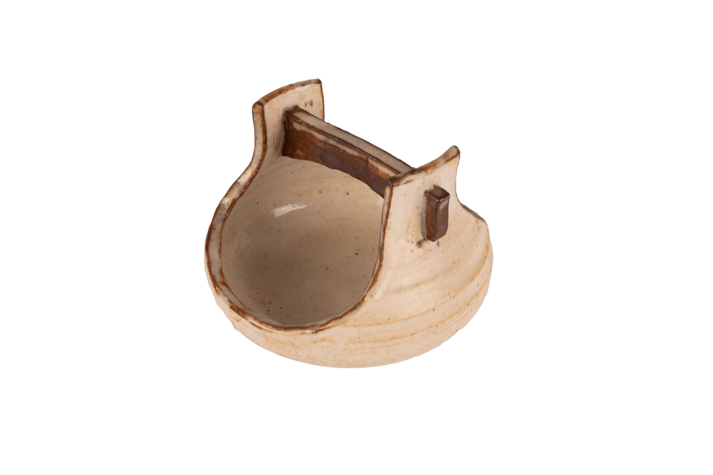 Small handmade studio pottery bowl with handle, light beige glaze, and stamped signature on bottom