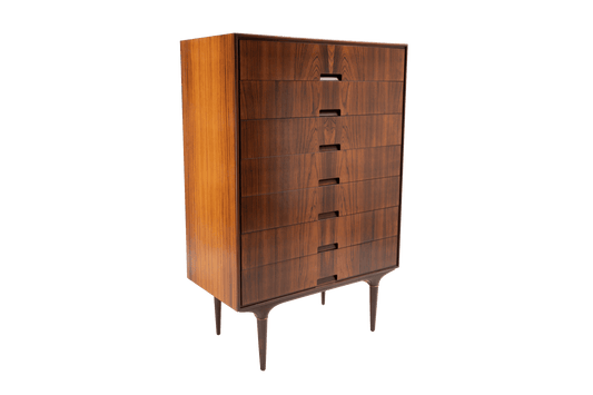 Mid-century modern rosewood dresser by Svante Skogh with bookmatched panels and brass-accented tapered legs