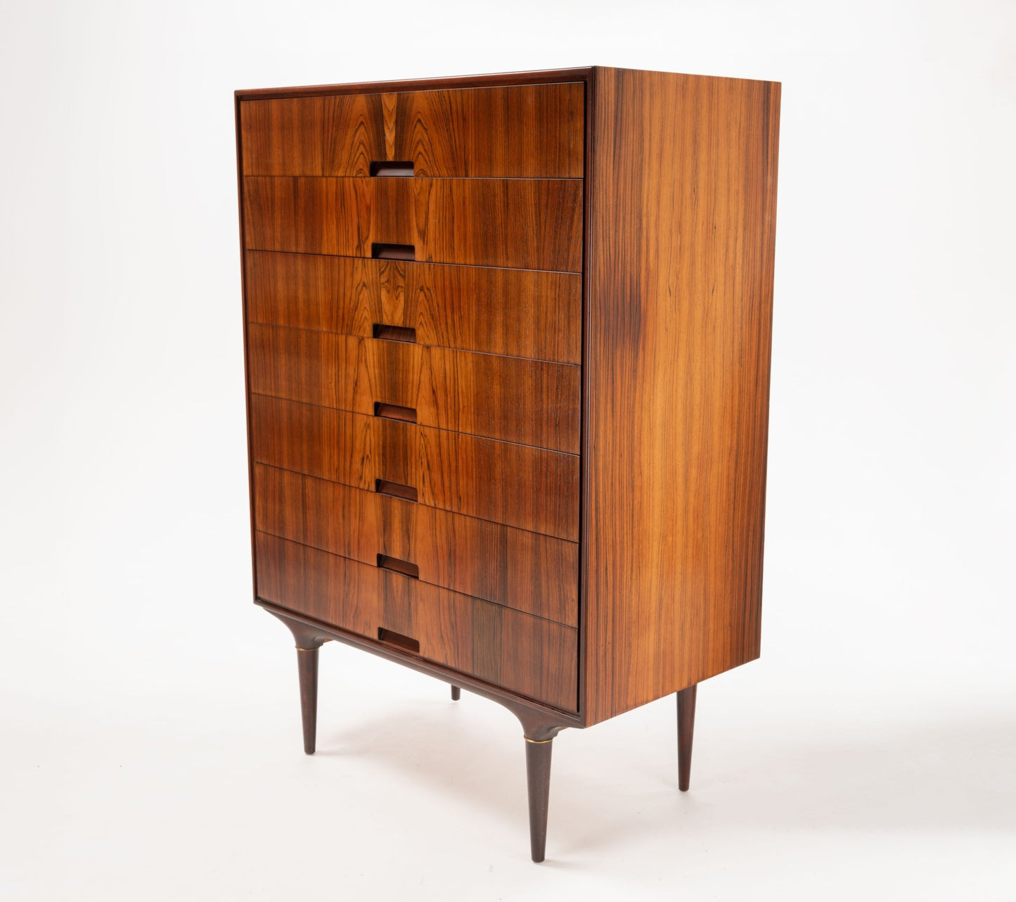1950s Swedish rosewood dresser by Svante Skogh for Seffle with bookmatched panels and brass-accented legs