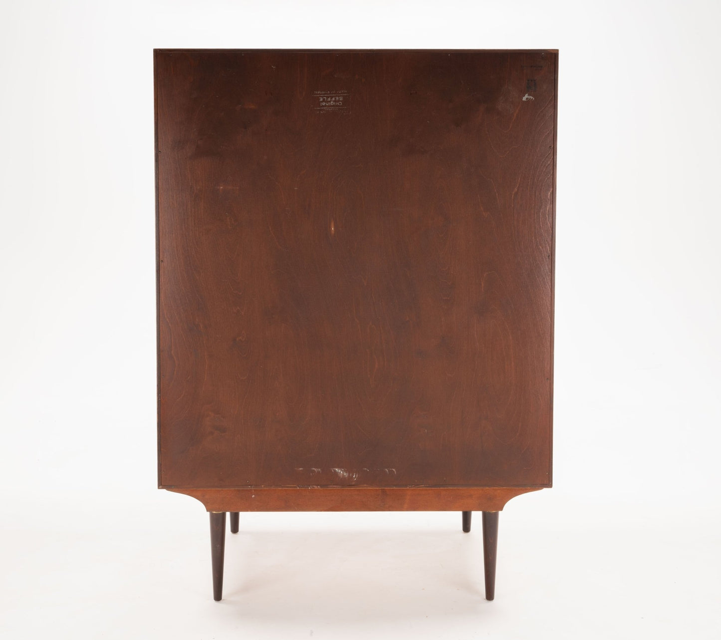Back view of mid-century modern Svante Skogh rosewood dresser with tapered legs and simple clean lines