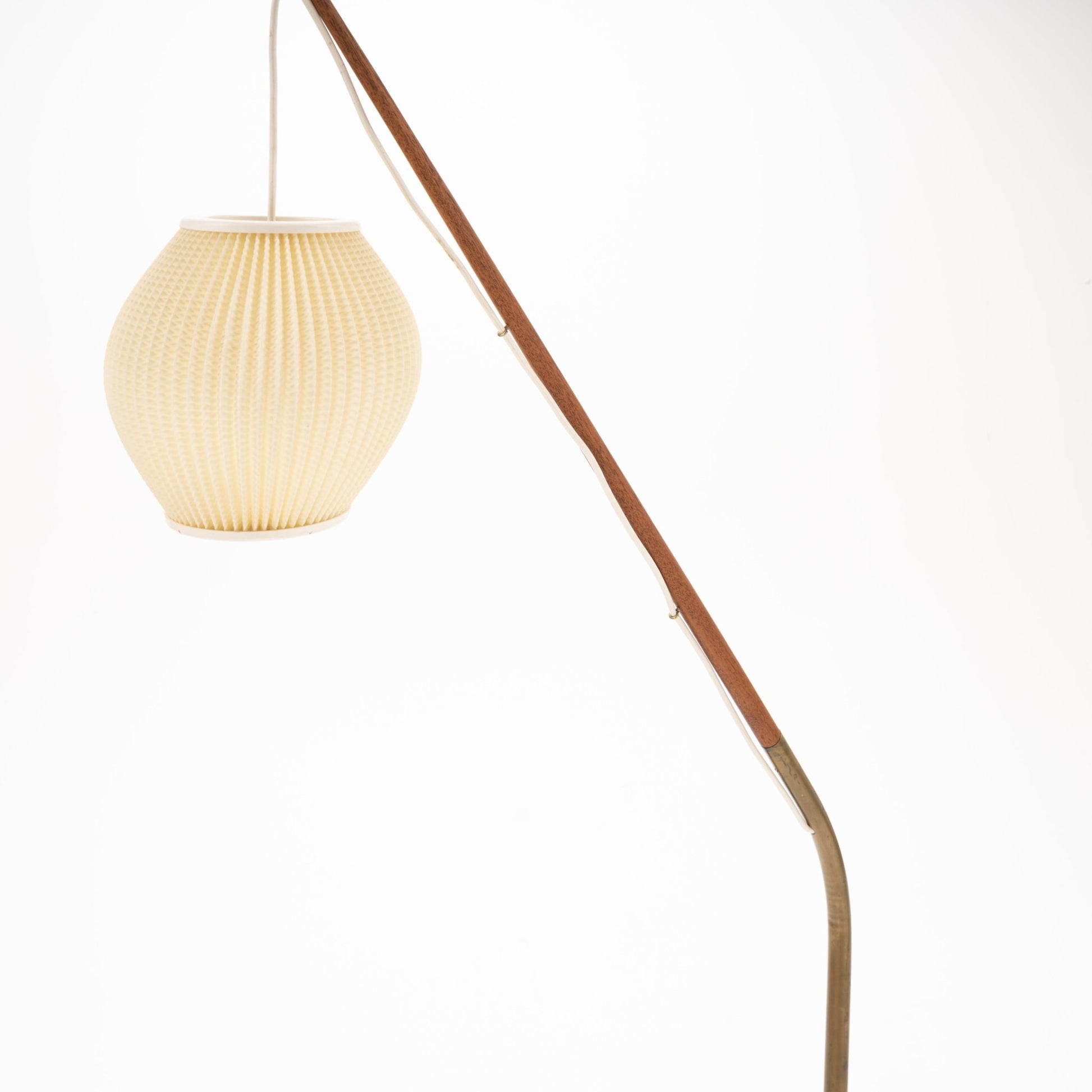 Svend Aage Holm Sorensen Floor Lamp with a long, angled wooden arm supporting a textured cream paper lantern shade, exemplifying vintage Danish mid century modern lighting design.