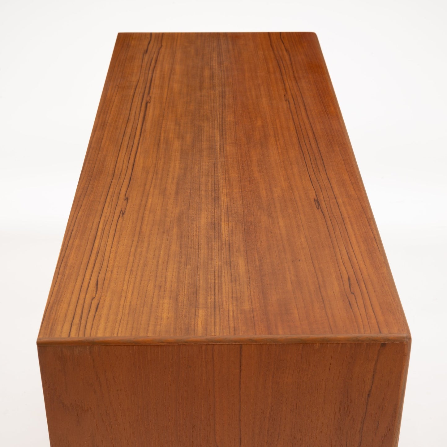 Swedish Teak Cabinet & Bookcase - Set 1 featuring a smooth teak wood top with rich grain patterns and a warm finish, highlighting classic mid century modern storage design.