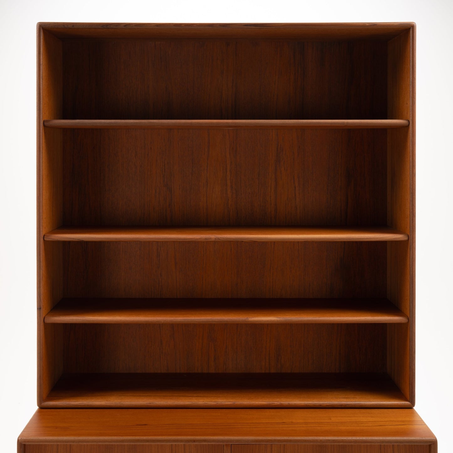Swedish Teak Cabinet & Bookcase - Set 1 featuring a minimalist teak wood frame with three evenly spaced shelves, showcasing clean lines and classic mid century modern storage elegance.