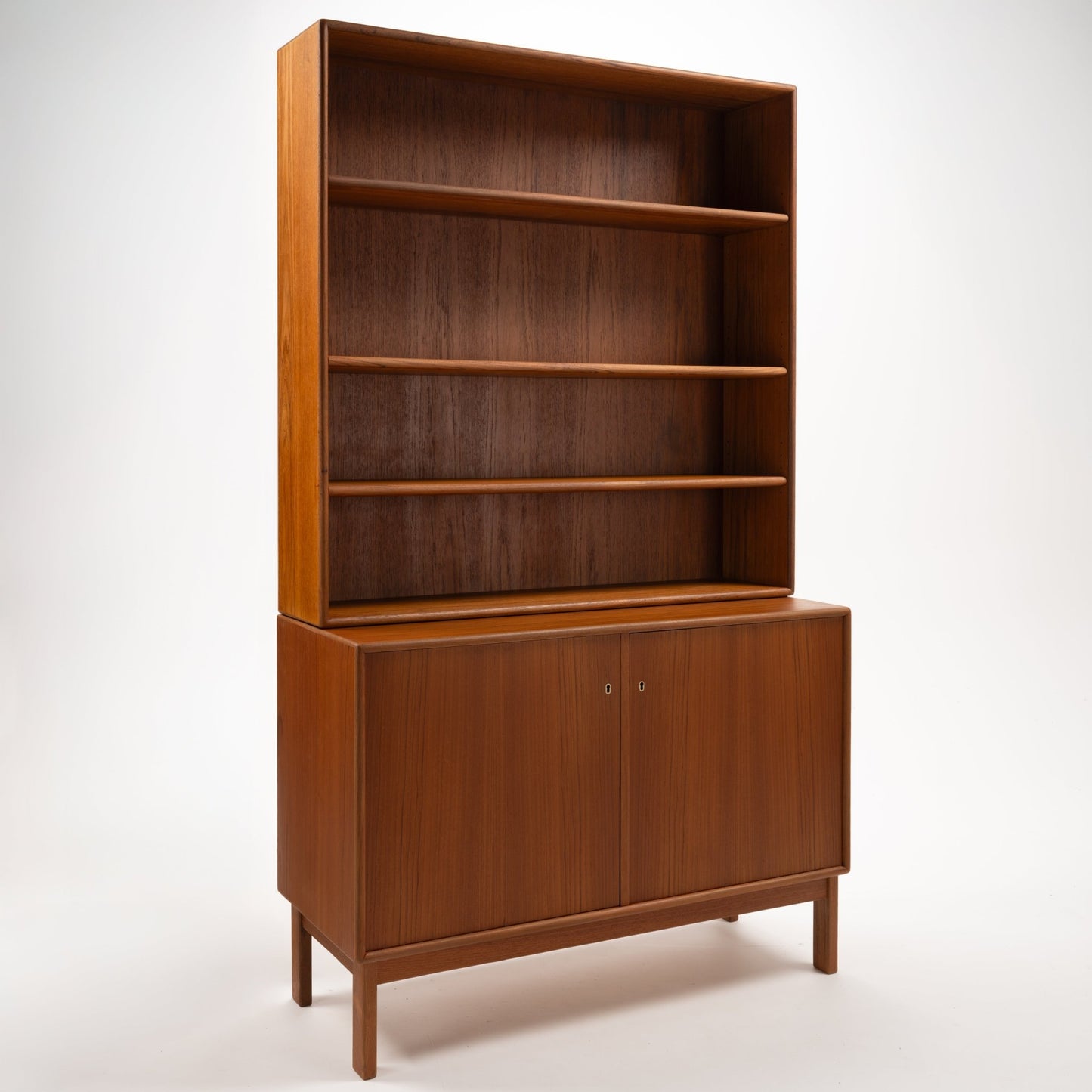 Swedish Teak Cabinet & Bookcase - Set 1 featuring a tall frame with three open shelves above and a closed cabinet with double doors below, showcasing refined mid century modern storage design.