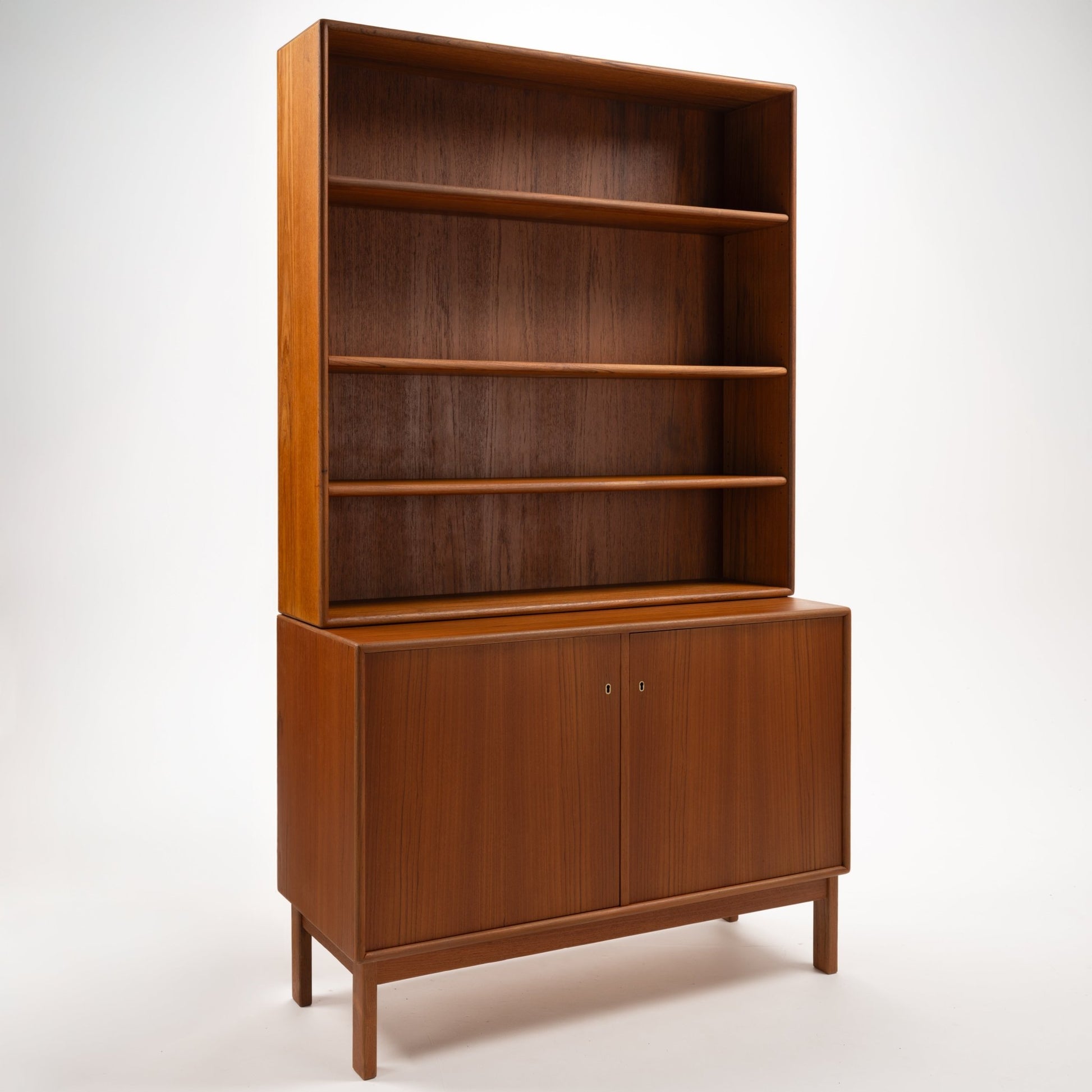 Swedish Teak Cabinet & Bookcase - Set 1 featuring a tall frame with three open shelves above and a closed cabinet with double doors below, showcasing refined mid century modern storage design.