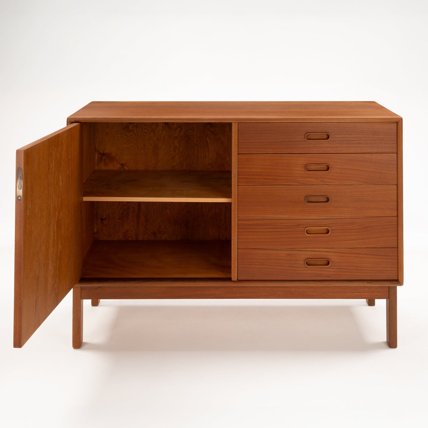 Swedish Teak Cabinet & Bookcase - Set 2 featuring a mid century modern storage unit with five drawers on the right and an open cabinet with two shelves on the left, crafted from warm teak wood.