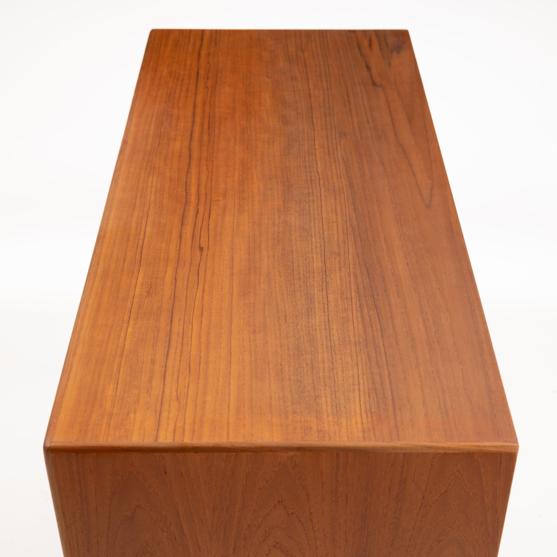 Swedish Teak Cabinet & Bookcase - Set 2 showcasing the smooth, warm teak wood surface with fine grain variations and a sleek, minimalist mid century modern design.